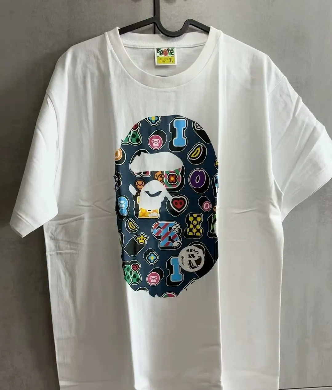P110 001134 bape printed short-sleeved T-shirt, same style for men and women, size smlxlxxl, black and white