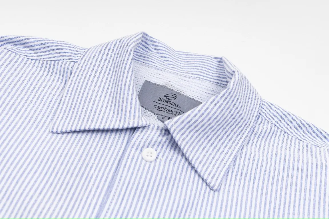 🅿️260 Carhart WIP ✖️ Invincible Carhart joint limited workwear striped shirt couple jacket 1️⃣ Made of thickened Oxford striped fabric, which is relatively thicker than ordinary shirt fabrics, and the workmanship details are perfectly controlled! The multi-pocket workwear design style can be worn perfectly with shirts and jackets! 2️⃣It is very youthful and energetic, and can be easily worn by both men and women. It is very in line with the fashion aesthetic concepts of today's young people! 3️⃣ A full set of customized accessories, complete with three standards, same style for men and women, a must-have for couples! Color: Striped Blue Sizes: S, M, L, XL