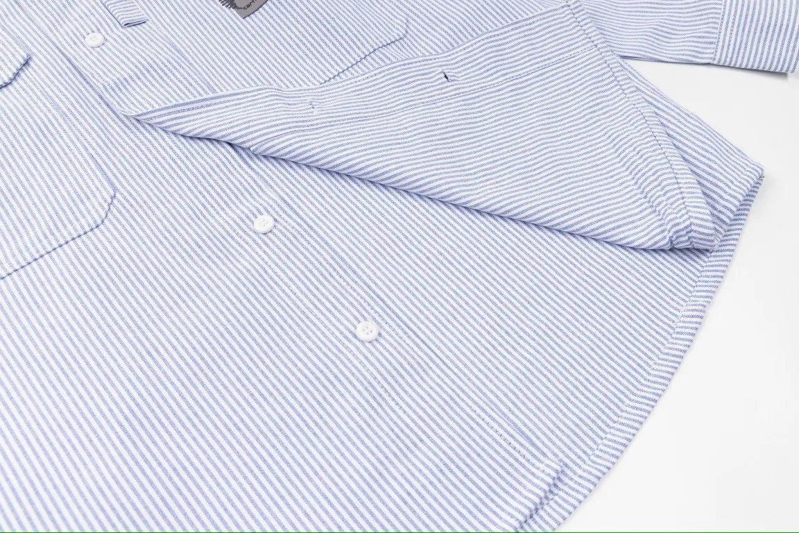 🅿️260 Carhart WIP ✖️ Invincible Carhart joint limited workwear striped shirt couple jacket 1️⃣ Made of thickened Oxford striped fabric, which is relatively thicker than ordinary shirt fabrics, and the workmanship details are perfectly controlled! The multi-pocket workwear design style can be worn perfectly with shirts and jackets! 2️⃣It is very youthful and energetic, and can be easily worn by both men and women. It is very in line with the fashion aesthetic concepts of today's young people! 3️⃣ A full set of customized accessories, complete with three standards, same style for men and women, a must-have for couples! Color: Striped Blue Sizes: S, M, L, XL