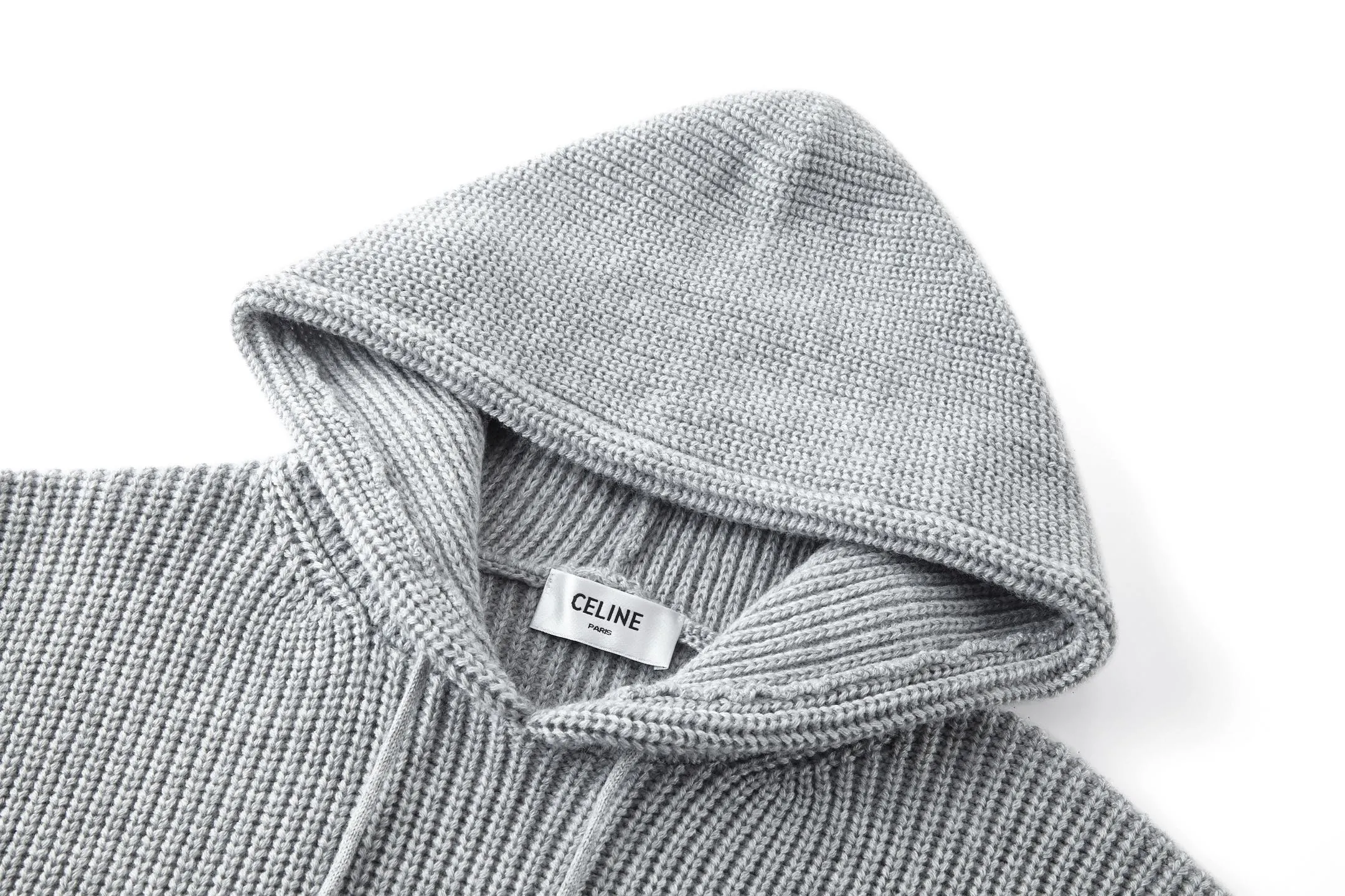 🅿️500 [Original quality] CELINE Celine embroidered logo knitted hoodie Fabric: Made of 55 merino wool yarn and cotton yarn. The finished product woven from this fabric has a three-dimensional shape, a soft hand feel, and no binding on the upper body.  Accessories: The hat rope tail clip adopts electroplating engraving process to restore the brand logo.  Craftsmanship: The embroidery uses towel embroidery technology and cashmere yarn to restore the original 1:1 details.  Process: Garment washing removes impurities on the wool surface - adding hand feel - fixing the pattern.  TRIOMPHE embroidered loose fit hood with adjustable drawstring, metal hoop engraved with CELINE PARIS 1 kangaroo pocket ribbed trim Accessories: Customized 1:1 washed logo Accessories: Customized 1:1 rope tail clip Craftsmanship: Customized 1:1 towel embroidery Size: S-M-L-XL Color: Gray