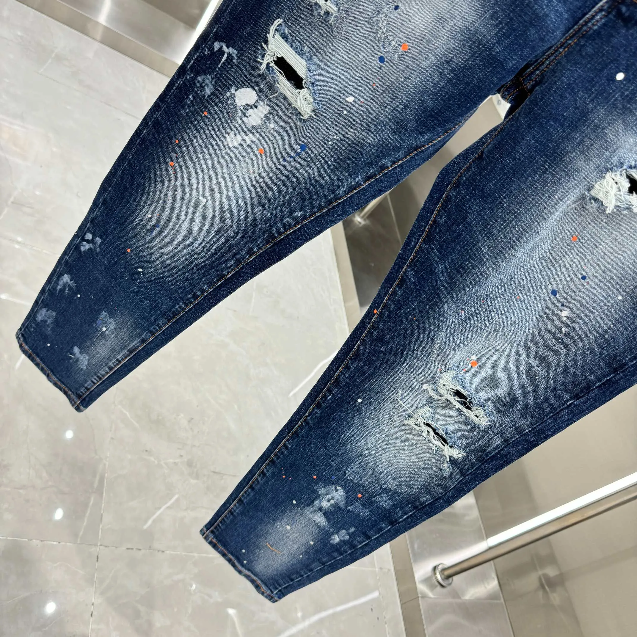 P300 DSQUARED2 graffiti hole washed craft street fashion slim fit stretch jeans color blue size 30 32 34 36 38 40