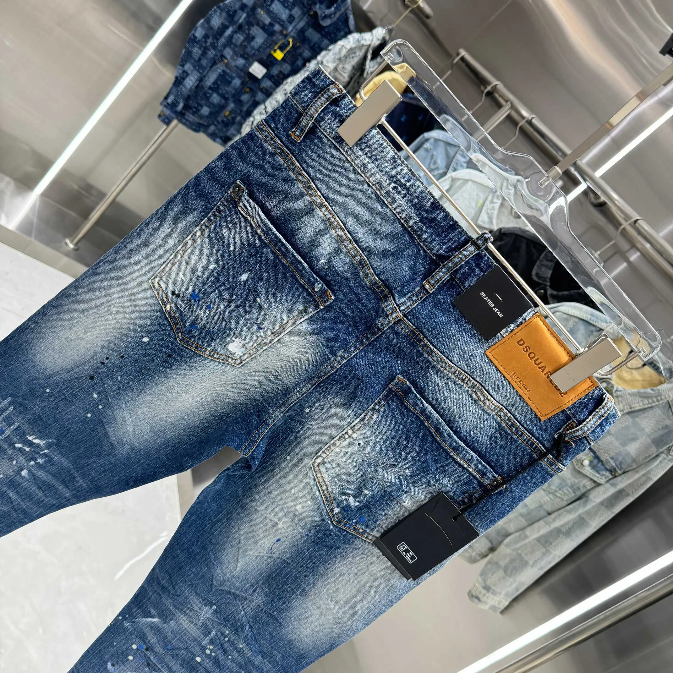 P300 DSQUARED2 graffiti hole washed craft street fashion slim fit stretch jeans color blue size 30 32 34 36 38 40