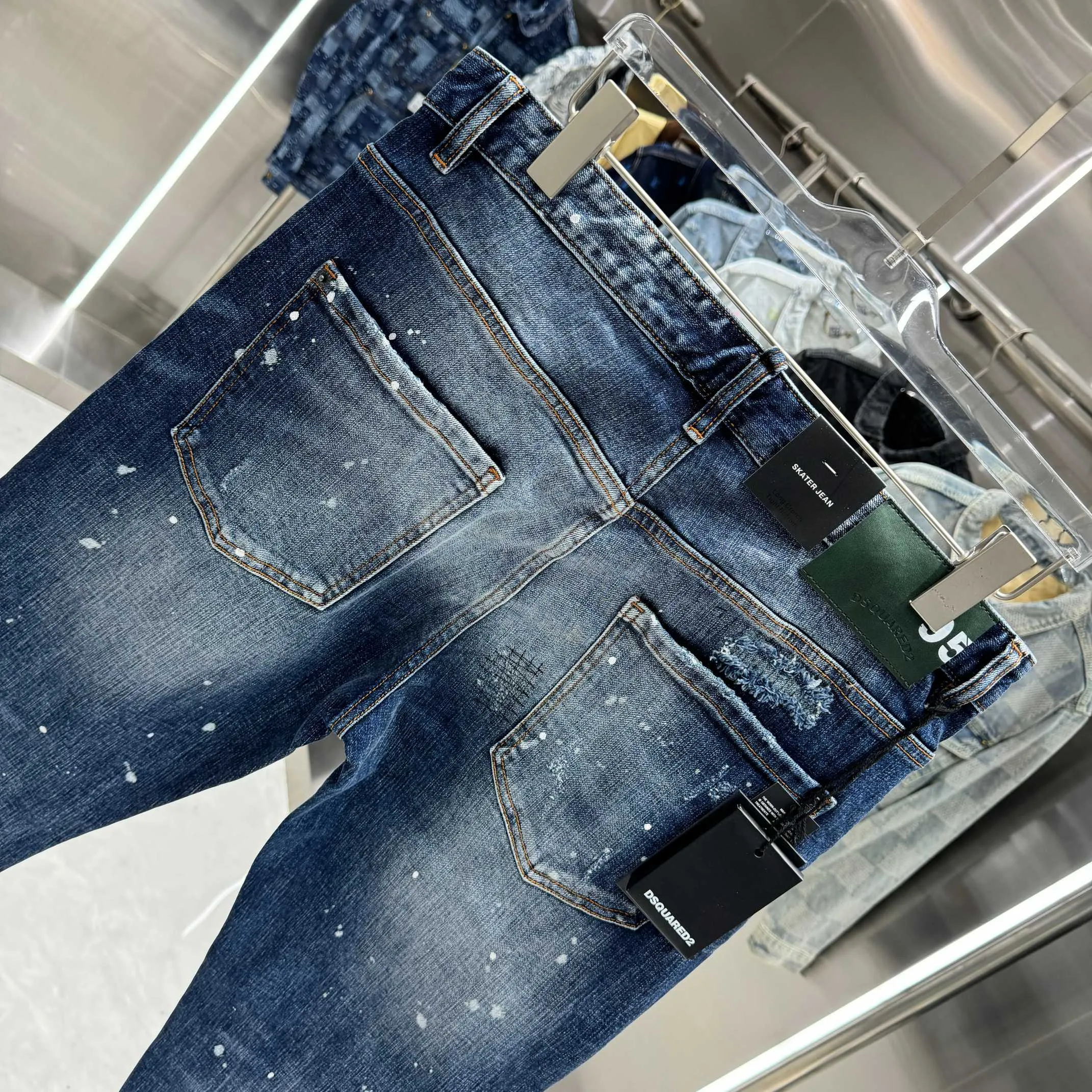P300 DSQUARED2 graffiti hole washed craft street fashion slim fit stretch jeans color blue size 30 32 34 36 38 40