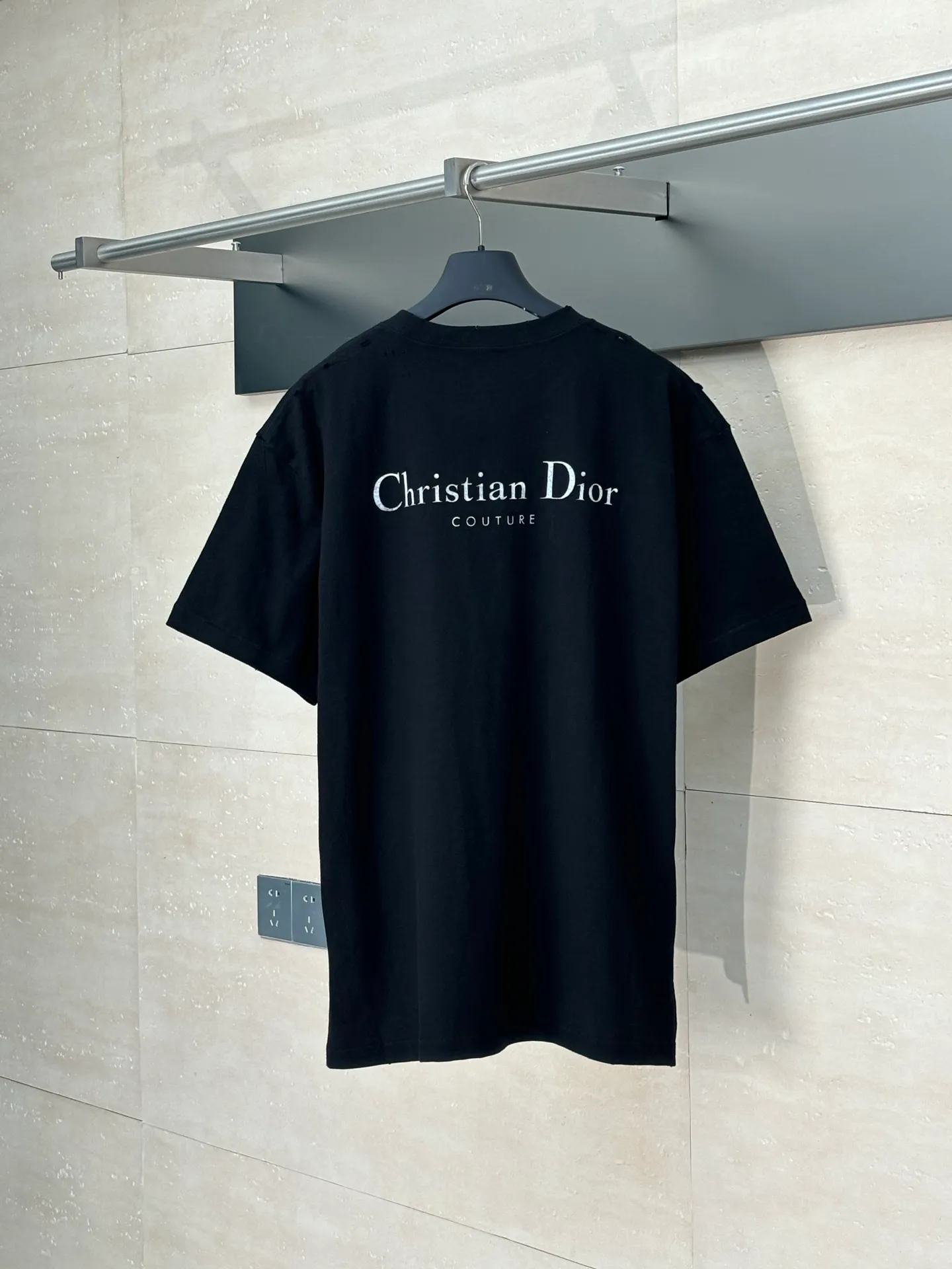 🅿️320 Dio*/Dior classic slogan letter printed hole washed short sleeves The fabric is made of 10s pure cotton slub plain fabric with a weight of 310g. This fabric is used as the collar, and the round collar is manually positioned on a flat machine. The front and back panels are printed with hand-made platen silk screen glue, and the film is engraved with laser dots to create a hollowed-out effect of missing letters. The clothes are designed with bifurcated sides, and the hems of the front and rear panels are cut with a special machine to pick the legs. There are lines on the surface to create a hollow effect. The entire garment is manually positioned and cut with holes, and the garment is fermented and washed to create a nostalgic effect. Size：S/M/L/XL