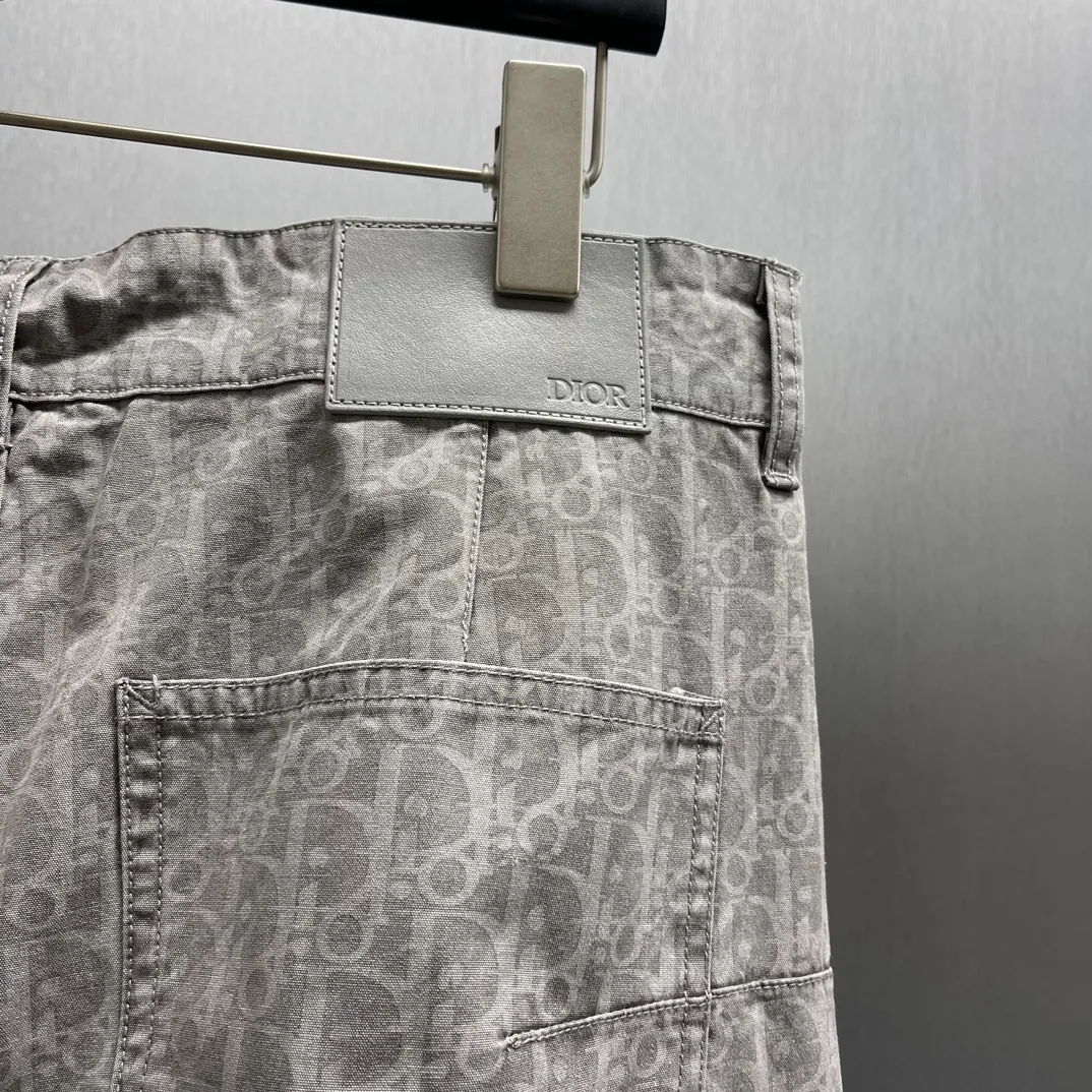 🅿️510 🧧CD Gray Cotton Denim Oblique Print Pants These work jeans display Oblique print, reinterpreting workwear style with a casual cut. Crafted from gray cotton denim and finished with classic . Blique print for an elegant look. Pair with the matching village shirt for a graphic look.