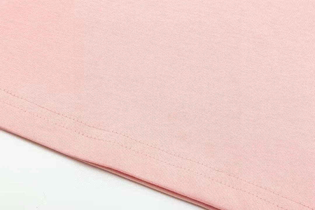🅿️170 (arrives the next day) DIOR Dior 2025 new line cat letter logo, same style for men and women, short-sleeved T-shirt ·Customized 300g 100% double yarn pure cotton fabric ·Design dyed 32 double-strand threads ·Collar label, hangtag, main mark and three labels complete Color: pink Size: XS S M L
