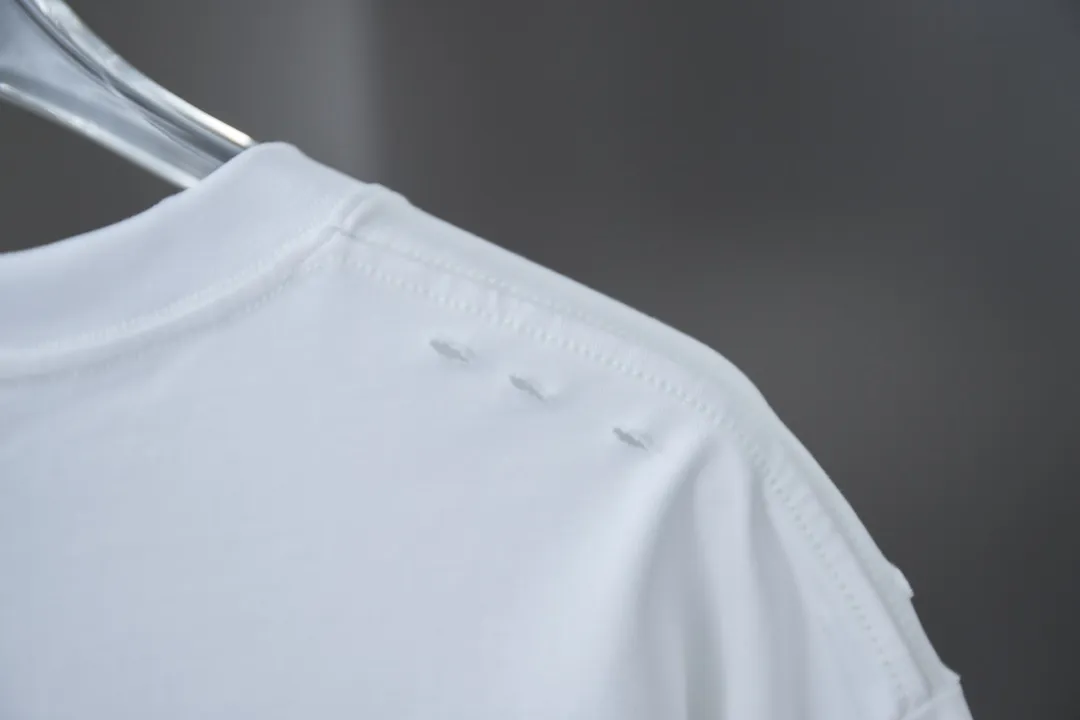 🅿️170 D＊or CD 25SS early spring new style joint series lily of the valley lettering logo frayed short sleeves light luxury essential item for daily commuting for men and women correct version welcome to compare detailed features · 320g 100% pure cotton double yarn jersey fabric · custom dyed in the same vat with special thickened 32 count double strand 1X1 thread · artificial hand printing screen printing lily of the valley lettering logo pattern · Cut all over, edged cuffs · Double-needle stitching across seams · Original main mark, washed tag, branded moisture-proof paper packaging Color: White/Iron Gray Size: S/M/L/XL