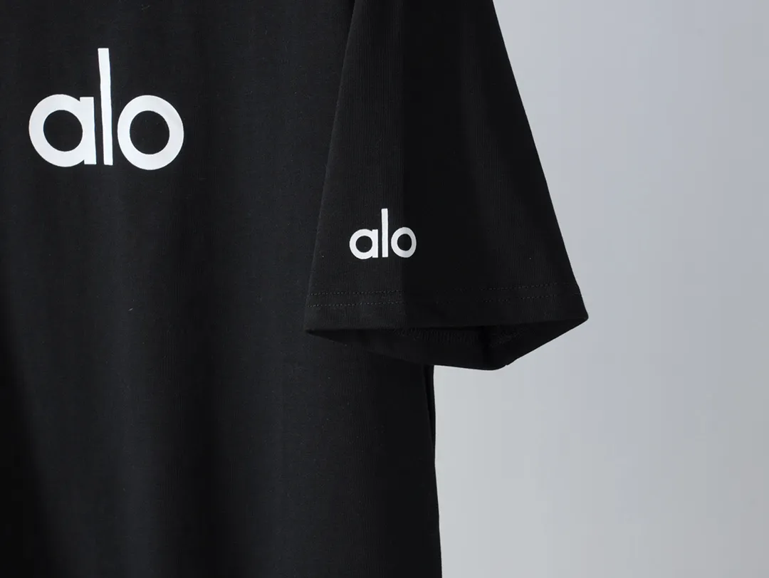 🅿️180 "alo1" Alo 2025ss letter printed logo simple short-sleeved T-shirt. Purchase the original version and develop it. Imported slurry. Can be washed casually without any deformation. Guaranteed not to fade or crack. Fine printing. Made of 280g combed cotton double yarn fabric. Fixed dyeing with 0 color difference. Same cylinder frame thread. 2 washes. Excellent hand feel. Customized original 6 hang tags and a full set of accessories. Invincible details. Distinguish junk version. Only high-end. -Color: white black -Size: xs ~ l