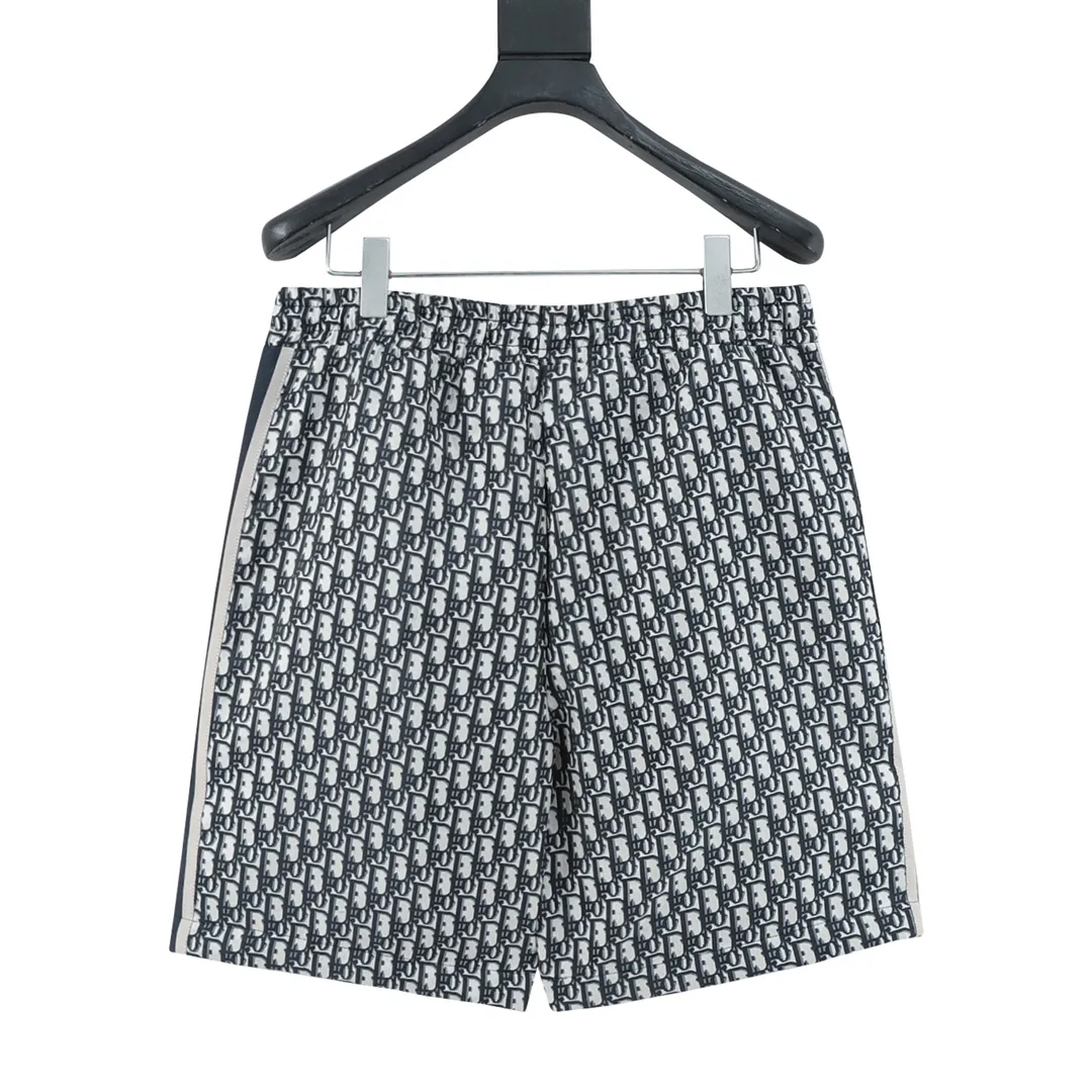 🅿️310 DIOR/Dior Presbyopic Ribbon Shorts. The original purchase of heavy-weight clothing is developed from raw materials. The highest version is released on the entire network. The fabric is made of imported raw materials, and the whole piece is Dr's classic jacquard weave. The minimum order is 8,000 meters of fabric, which is produced day and night by imported yarn-dyed looms. The daily output of each machine is only 40 meters. All alignment materials are close to 4 meters. The position spacing of the letter webbing and the webbing effect are completely consistent with the original version. The entire garment is lined with black fabric imported from South Korea. The placket zipper is made from a unified mold and is custom-made, and the rails are machine-pressed from imported environmentally friendly materials. After the lower corner rope is woven, the core dyeing technology is used to achieve the final dyeing effect. After pattern development and pattern making, computer intelligent cutting is used to increase work efficiency while ensuring the integrity of the pattern. The upper body effect is restored consistently! ! ! Size：XS-L