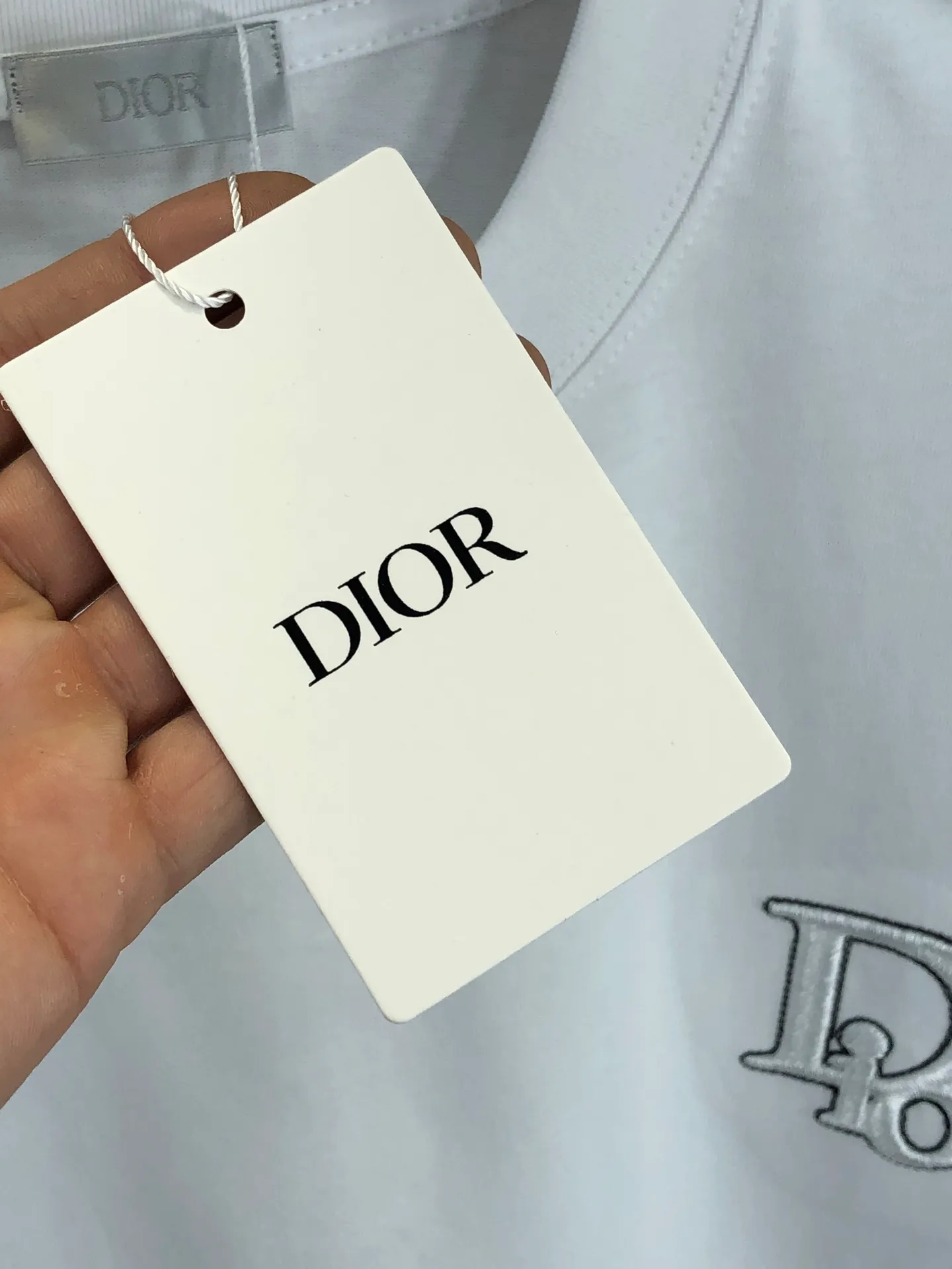 🅿️200 Dior 2025 Spring and Summer New Style Round Neck Short Sleeves Hollow Embroidery of Arch Bridge ➕Single Needle Embroidery Full of Details Made of High Weight 320g Double Yarn Combed Cotton Fabric Slightly Loose Fit Fabric Feels Soft and Thick Same Style for Men and Women Color: Black White Code Number: SMLXLXXL