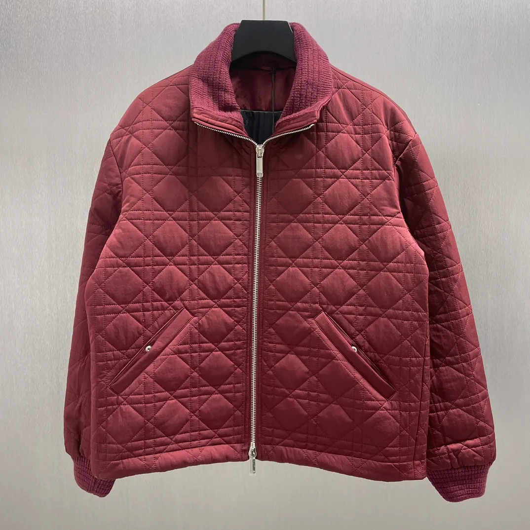 🅿️760 🧧CD Cannage Burgundy Jacket SIZE: S-XL This cannage jacket reinterprets Dior’s classic pattern. Crafted from burgundy technical fabric, it features an all-over quilted cannage pattern, a ribbed collar and cuffs, and untucked stash pockets. Wear it with jeans or tailored trousers.