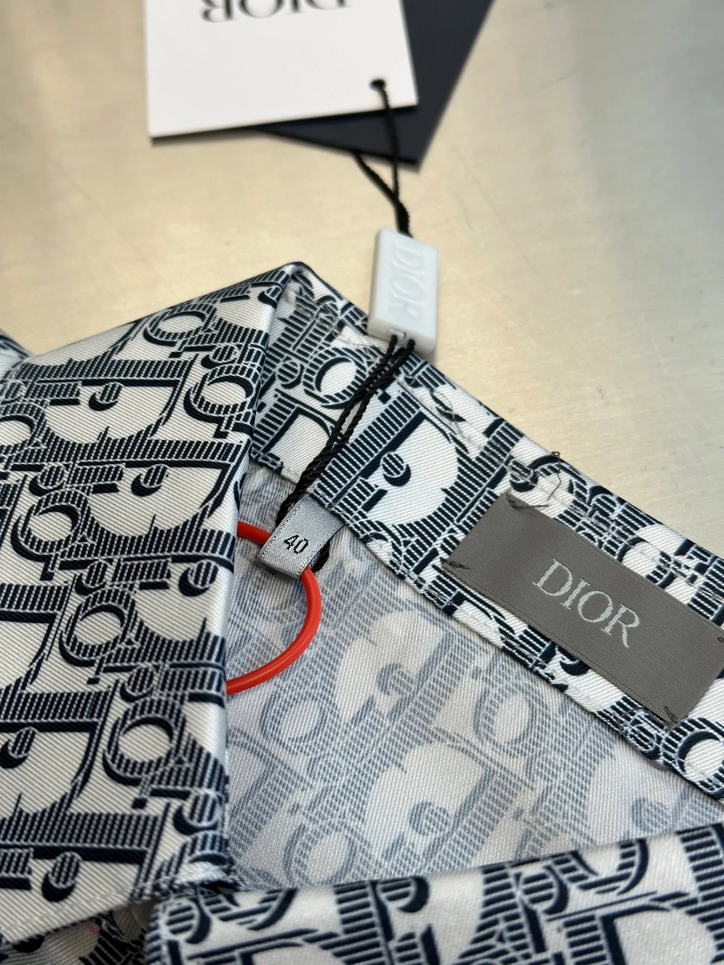 🅿️470 Dior Oblique all-over printed shirt. Customized polyester premium shirt material. The whole body is decorated with the same color Oblique print and integrated with the shirt, highlighting the noble temperament of the brand.  Digital printing technology uses digital pattern design and prints the pattern directly on the fabric through an inkjet printer to achieve full Dior Oblique printing.  The ironing position uses a high-temperature ironing machine. Through the synergistic effect of the heating plate and the pressure roller, high temperature and pressure are applied to the fabric to make the surface of the fabric smooth, crisp, wear-resistant and washable.  size: 39.40.41.42