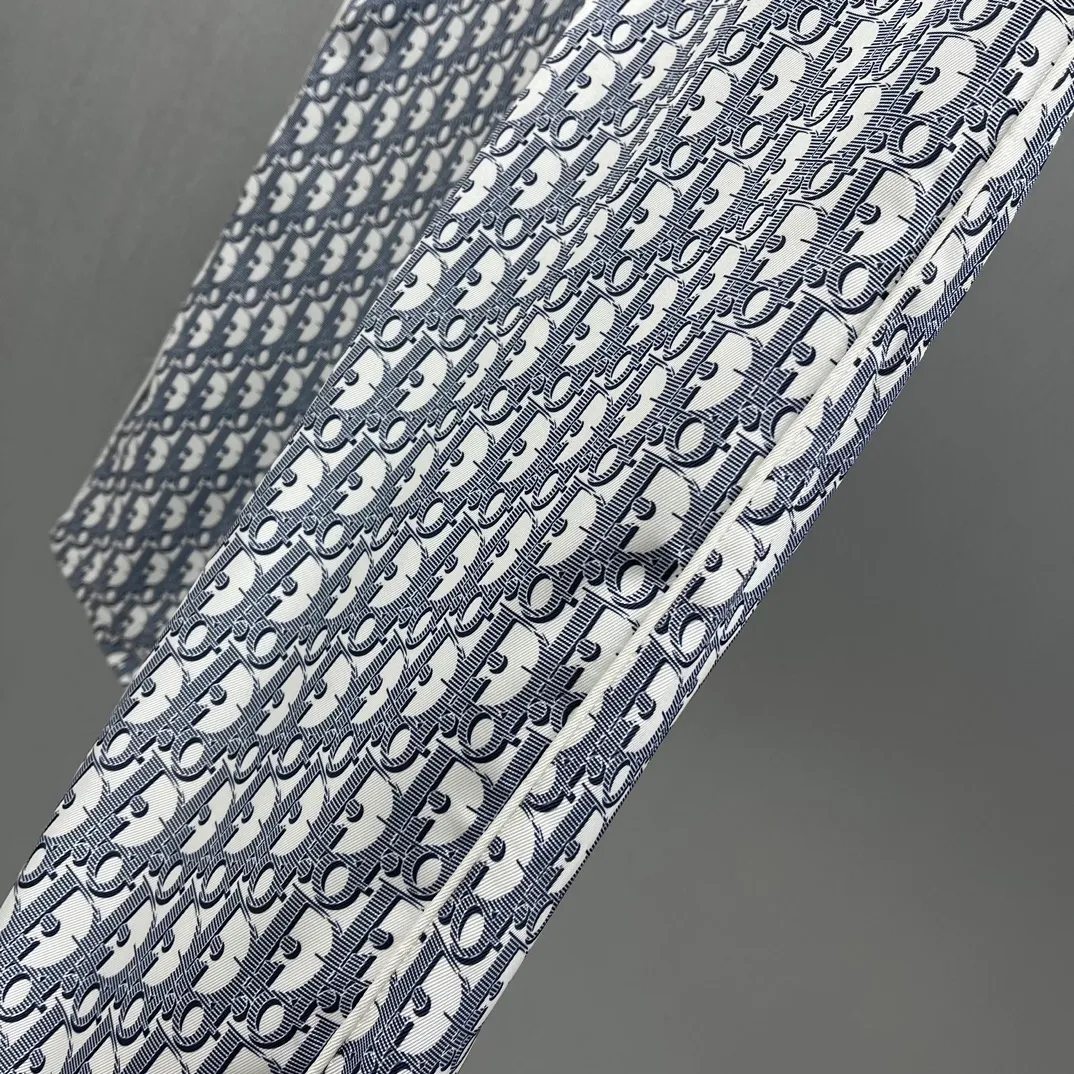 🅿️430 🧧CD Allover Printed Presbyopic Pajama Pants Size: S-XL These pajamas feature the brand’s classic Oblique print all over. Crafted from white and blue mulberry silk twill, it features an elasticated drawstring waistband, side slit pockets and rear welt pockets.