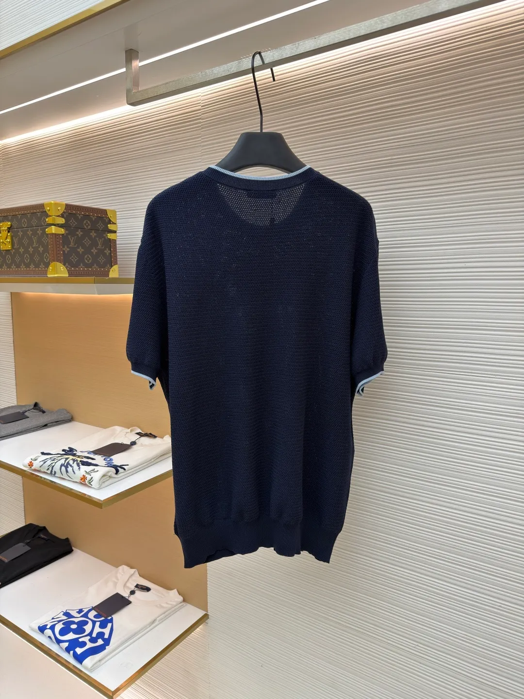 Prada letter logo sweater ●Original version: Purchased and developed for 13800 ●Item number: 1682372-A45 ●Fabric: ice silk wool fabric ●Technology: knitted production ●Color: navy blue ●Version: fitted version ●Weight: about 335 grams ●Size: 48-50-52-54 ●Description: Custom-woven, custom-dyed, luxurious and ultra-fine ice silk wool, soft and silky, comfortable and skin-friendly The main color is deep navy blue, with a touch of smart light blue edges, injecting a sense of agility. The hem of the body is embellished with the Prada letter logo, adding brand recognition. Pure lines are used to outline a simple outline, breaking the monotony in a concise way, showing a luxurious texture in a low-key manner. Imported machine embroidery technology, computer control system and precision mechanical components are used to realize the Prada logo embroidery operation with high precision and smooth and delicate lines. The curved thread structure changes the stitching and yarn arrangement during the knitting process to create a curved distribution of yarns in the fabric. The garment washing water is softened and deodorized. Professional washing equipment and specific detergents are used to deeply clean and deodorize the clothes to improve the feel and appearance of the clothes. The overall wiring is straight and delicate, the fabric is comfortable and soft, and the color is consistent without color difference. It can be matched with the same style to create a fashionable look and control various occasions. Customized accessories, complete with three standards, same style for men and women!
