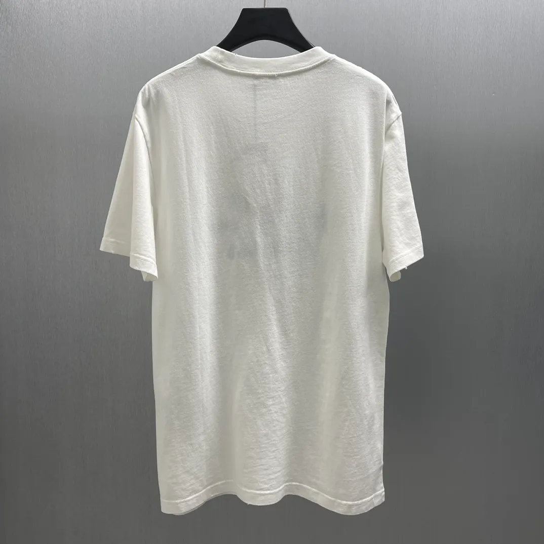 🅿️260 🧧CD True Friends Private Lettered Short Sleeves Size: S-XL This T-shirt displays the Dior For My Real Friends logo from the DIOR AND HYLTON NEL joint series. Crafted from white cotton jersey, it features a classic silhouette with a ribbed crew neck, embroidery on the chest for added style, and a burned-out effect on the collar, sleeves and hem. Cut for a relaxed fit, wear it with track pants or jeans.