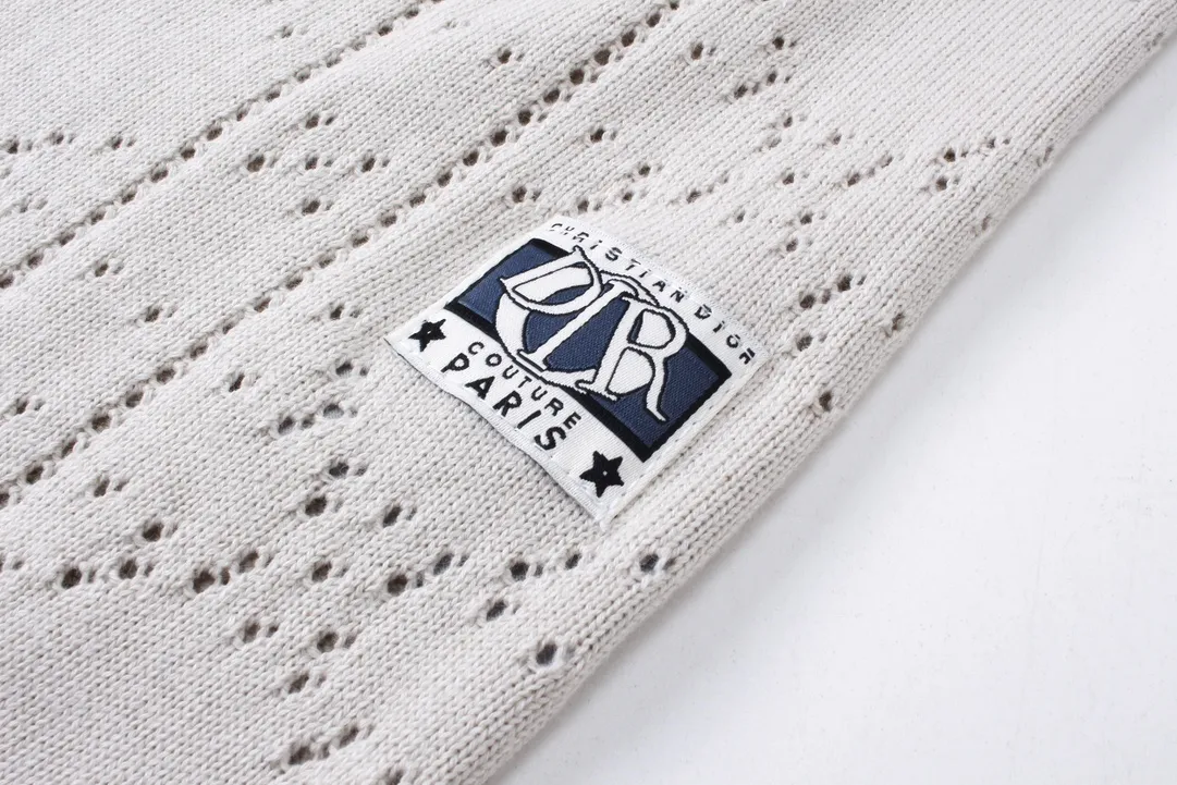 🅿️260 Dior CD2024SS diamond-shaped hollow knitted lapel POLO. European and American style early spring new small label cannage pattern hollow knitted short-sleeved polo cardigan casual fashion shirt The fabric is made of 150D/48F polyester special-shaped light long fiber yarn + 40 double-ply ring-spun pure cotton yarn. The Y version is purchased, disassembled and cut off the hem fabric, and sent to a professional inspection and testing agency to analyze the yarn count data. A 24-needle cylindrical jacquard loom imported from Italy is used to weave the gray fabric. The gray fabric is washed and shaped in the cylinder to produce the finished fabric. It uses an infrared cutting machine for typesetting, and the positioning flower letter logo is cut by hand, and it is matched with 26s cotton yarn-dyed ribbing. Blue/apricot, same style for men and women! Size: XS-L,