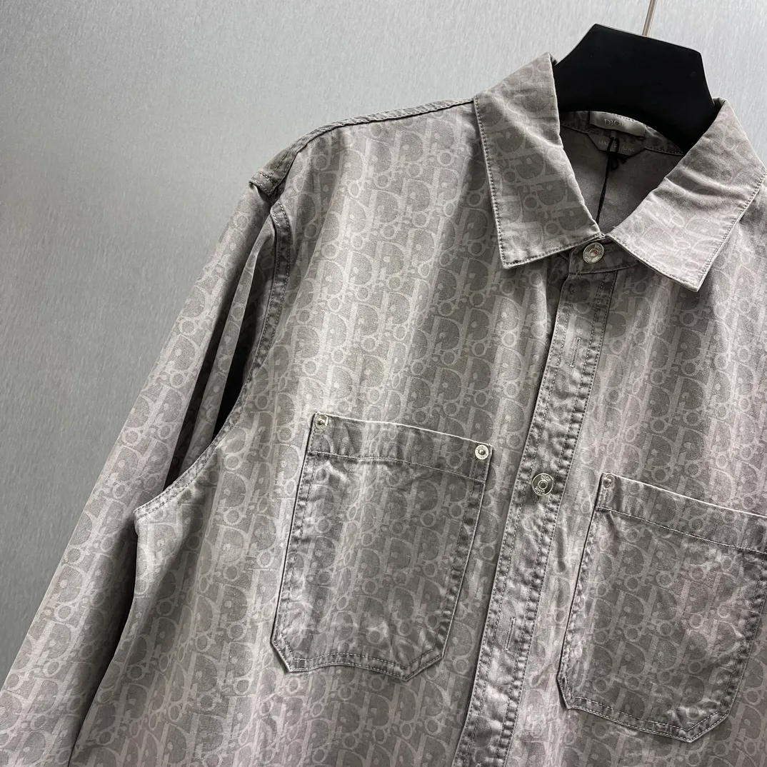 🅿️530 🧧CD gray cotton denim Oblique print jacket shirt Size: S-XL This jacket shirt is decorated with Oblique print all over, a new interpretation of Dior's classic pattern. Crafted from gray cotton denim, it features a patch pocket on the chest and buttons with Dior signature. The unique minimalist design pairs well with sportswear or a more classic look.