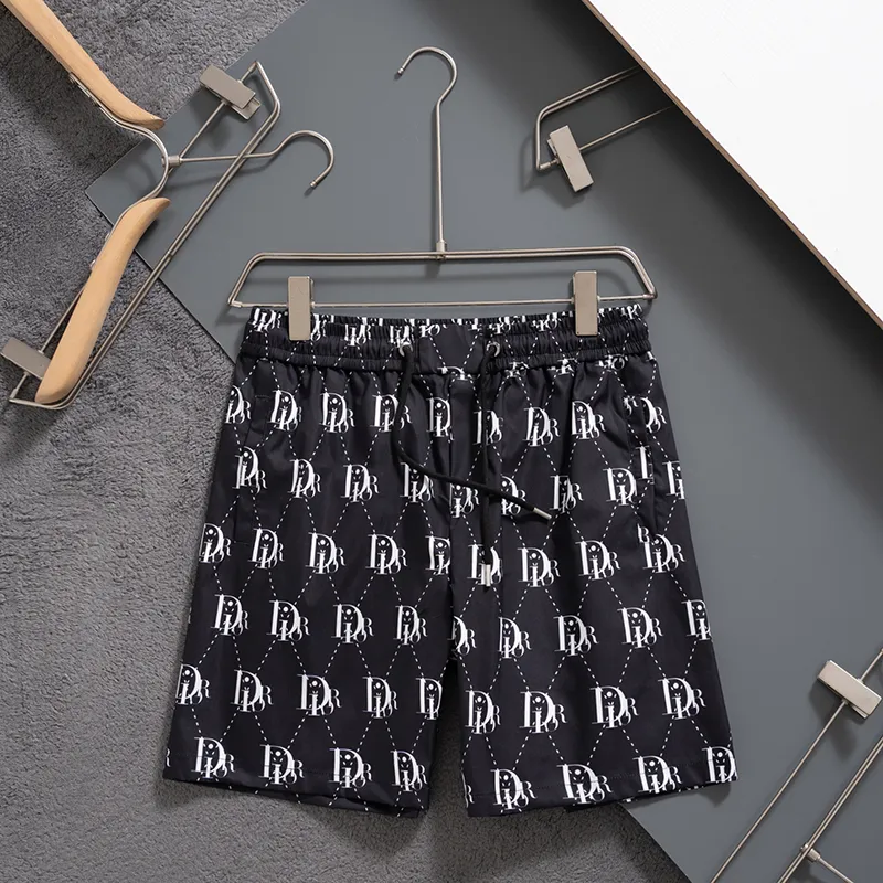 🅿️130 #V2510 [Restock all year round] Dior 2025 latest style shorts and beach shorts, a must-have for beach travel, high-order original hardware! The upper body effect is super positive, and the leg lines are fully highlighted. The texture of imported quick-drying fabrics is tight and delicate, and the panoramic high-definition logo design makes the upper body very comfortable and stylish. It is also extremely practical and versatile. It is worth buying! Color: Black Size: M L XL XXL 3XL