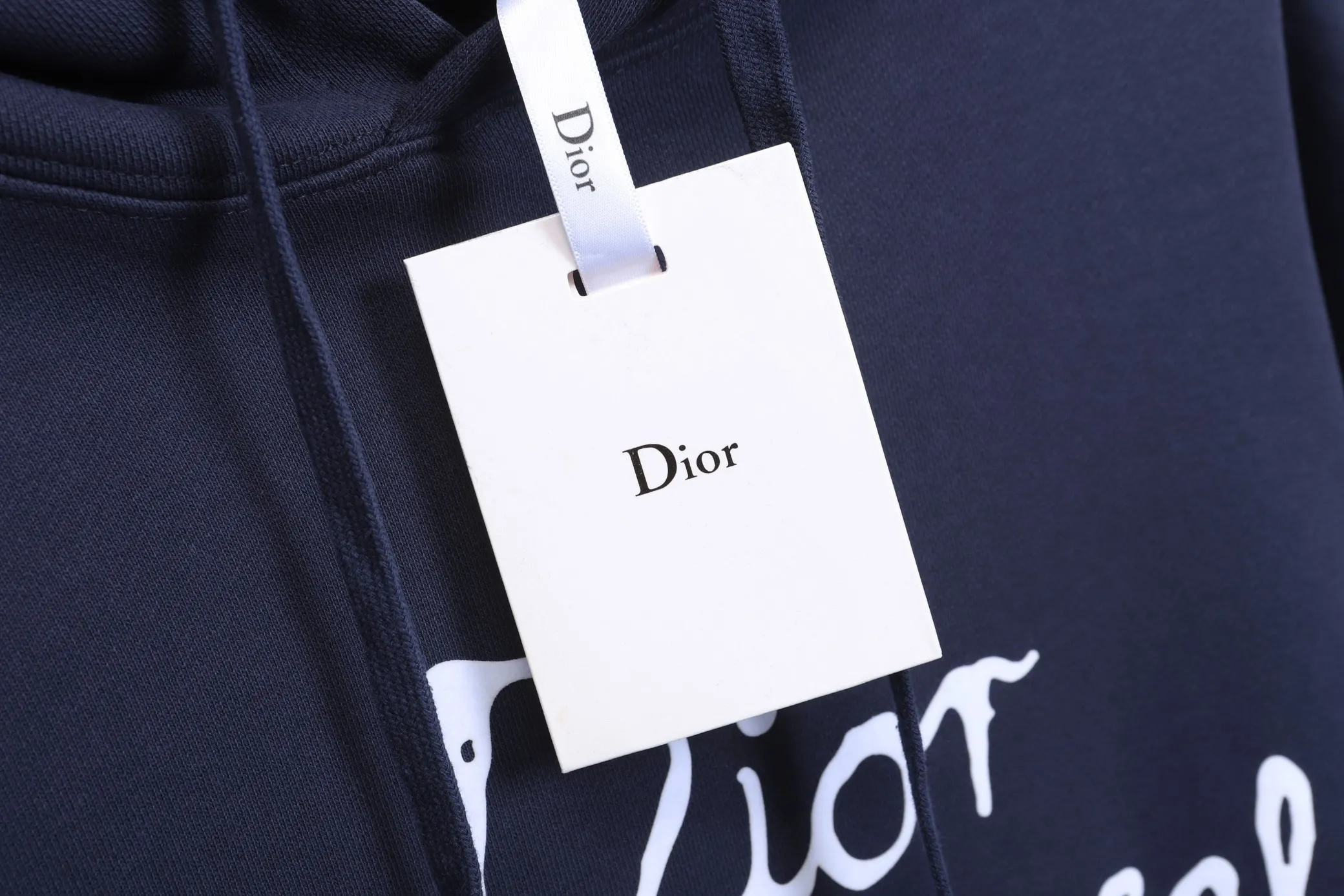 🅿️320 High quality new Dior hooded sweatshirt model number B31 * Made of 450 custom-woven and dyed high-gram weight tripe pure cotton sweatshirt fabric. The fabric feels thick and has a certain sense of self-weight. The bottom has a dense and rough terry texture. It is close to the skin and has excellent warmth retention. You will not feel any discomfort at all! *The color on the front chest is clear, with Selling's obvious logo added, and the lines are smooth and smooth without falling off and deforming when washed *This design is based on classics and simply and clearly shows the brand's high-end luxury identity. Same style for men and women 𝐂𝐎𝐋𝐎𝐔𝐑: black, white blue 𝐒𝐈𝐙𝐄: S- xl
