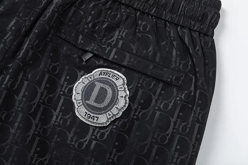 🅿️210 DiOr Dior 2025 Spring and Summer Logo printed all over. New fashionable beach shorts, with lining and mesh shorts! The official website is synchronized with the original 1-1 replica, the original hardware is selected from high-quality polyester fiber fabrics, with a delicate feel, a must-have item for summer, and the upper body effect is super handsome! Color: Black Size: S M L XL XXL
