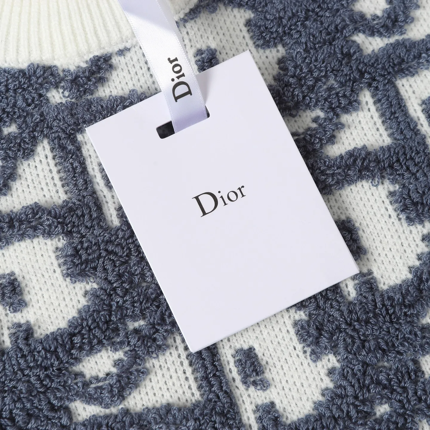 🅿️450 CD Home Jacquard Fabric Oblique Printed Sweater Details and Features This sweater reinterprets the Dior classic logo from a fashionable and modern perspective. Crafted from blended jacquard fabric, it's accentuated with a raised all-over classic light green Oblique print. Zippered sleeves add style, while a ribbed crew neck adds contrasting texture. Wear it with jeans for a graphic, casual look. All-over Oblique print sleeves with zip closure Contrasting ribbed crew neck Size: S M L