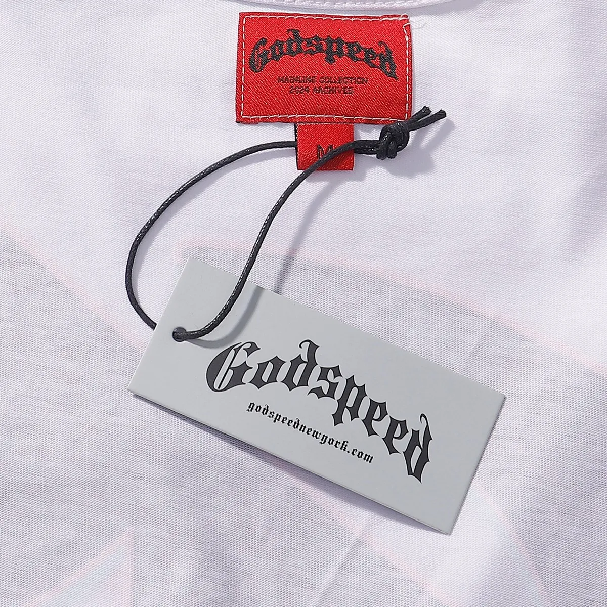 No. 7038, 2025 Meichao Godspeed technology staring skull print high quality double yarn pure cotton casual short-sleeved T-shirt batch 110 Color: black, white; Size: S M L XL