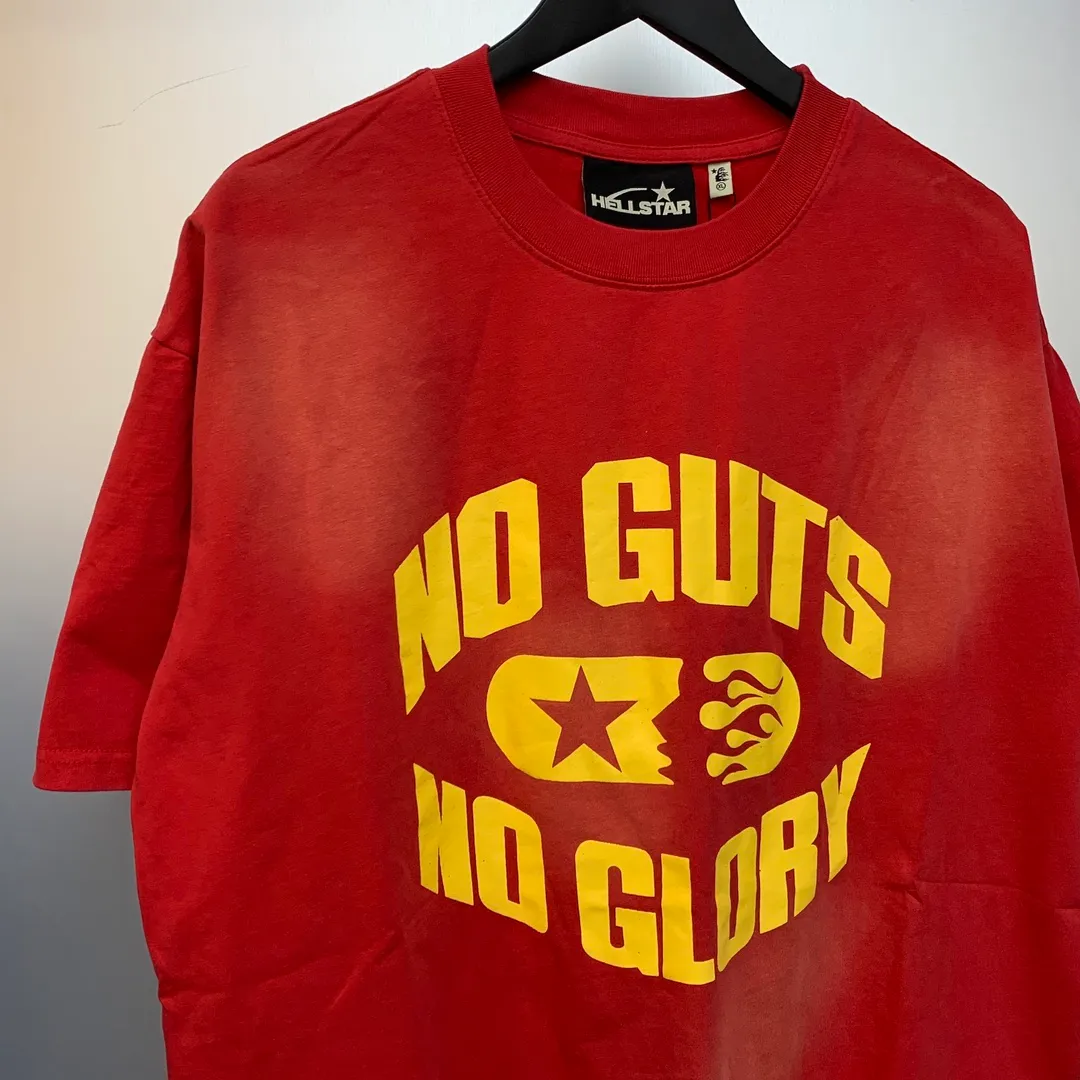 P126 Hellstar No Guts No Glory T-Shirt Custom Cut and sew garment manufactured in Los Angeles. Dyed and potassium sprayed with jumbo screen print. Fits slightly oversized. Gentle wash tumble dry. Dry clean preferred Newly popular Hellstar short-sleeved T-shirt!   Standard beauty and trendy workmanship, original customization (fabric, pattern, printing, hang tag, main mark, etc.), exaggerated style, explosive style, dare to break through tradition, bring adventurous new fashion experience!  YoungBoy, the most popular rapper in the youth circle, has shot a lot of models for him, and celebrities such as Dababy and Swae Lee frequently get dressed!   color: red Size: S, M, L, XL