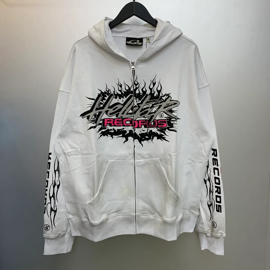 P240 HELLSTAR RECORDS GLITTER ZIP-UP High-quality pure cotton cardigan and sweatshirt jacket The new hot beauty trend Hellstar!  Standard beauty and trendy workmanship, original customization (fabric, pattern, printing, hang tag, main mark, etc.), exaggerated style, explosive style, dare to break through tradition, bring adventurous new fashion experience!   YoungBoy, the most popular rapper in the youth circle, has shot a lot of models for him, and celebrities such as Dababy and Swae Lee frequently get dressed!  color: WHITE Size: S, M, L, XL