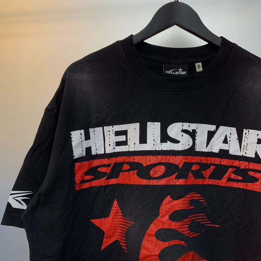 P134 Hellstar Family Tee( T-shirt) Custom Cut and sew garment manufactured in Los Angeles. Dyed and potassium sprayed with jumbo screen print. Fits slightly oversized. Gentle wash tumble dry. Dry clean preferred Newly popular and trendy Hellstar short-sleeved T-shirt!   Standard beauty and trendy workmanship, original customization (fabric, pattern, printing, hang tag, main mark, etc.), exaggerated style, explosive style, dare to break through tradition, bring adventurous new fashion experience!  YoungBoy, the most popular rapper in the youth circle, has shot a lot of models for him, and celebrities such as Dababy and Swae Lee frequently get dressed!  color: Vintage Black (washed black)