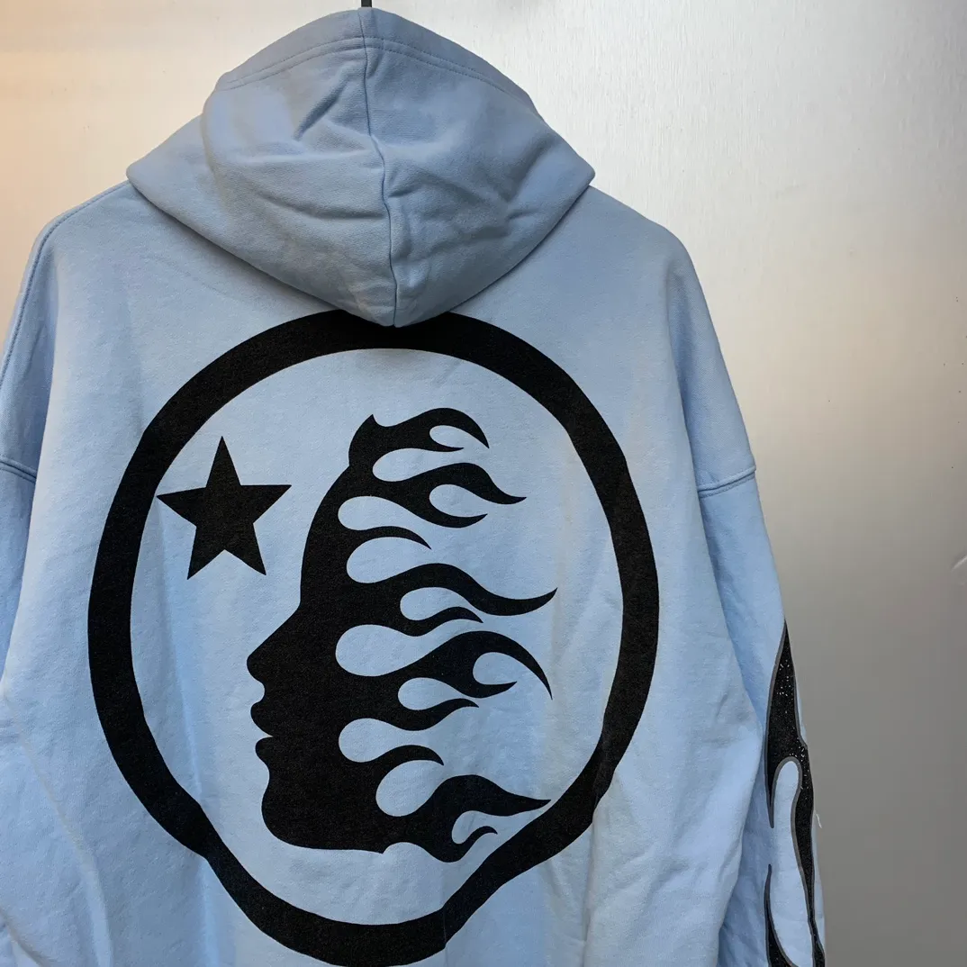 P240 HELLSTAR STUDIOS ZIP HOODIE American fashion classic logo printed washed and worn hoodie sweatshirt cardigan jacket New hot beauty fashion Hellstar!  Standard beauty and trendy workmanship, original customization (fabric, pattern, printing, hangtag, main mark, etc.), exaggerated style, explosive style, dare to break through tradition, bring adventurous new fashion experience!   YoungBoy, the most popular rapper in the youth circle, has shot a lot of models for him, and celebrities such as Dababy and Swae Lee frequently get dressed!  color: blue Size: S, M, L, XL