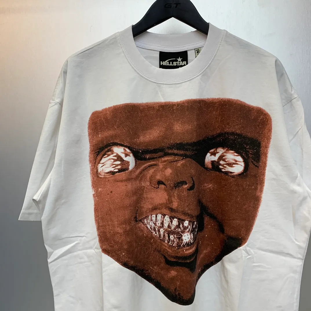 P134 HELLSTAR CHUCKY T SHIRT HALLOWEEN Washed and ripped high-quality pure cotton T-shirt short-sleeve. The new hot beauty trend Hellstar!  Standard beauty and trendy workmanship, original customization (fabric, pattern, printing, hang tag, main mark, etc.), exaggerated style, explosive style, dare to break through tradition, bring adventurous new fashion experience!   YoungBoy, the most popular rapper in the youth circle, has shot a lot of models for him, and celebrities such as Dababy and Swae Lee frequently get dressed!  color: white Size: S, M, L, XL