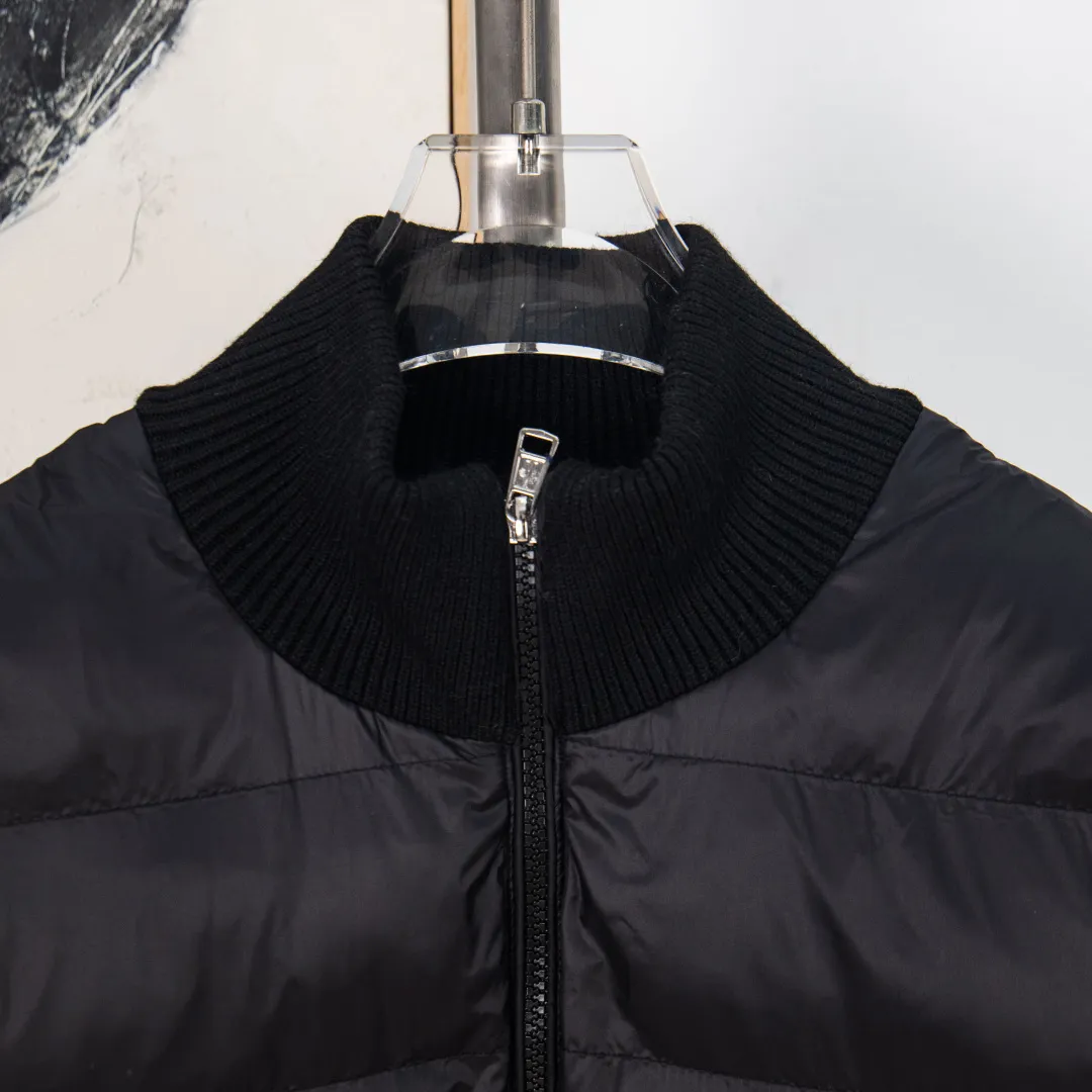 P500 💰zp version [Exclusive supply] MONCLER/Mongolian knitted down spliced ​​stand-up collar, unique side thread design! ! ! Selling point: down knitted splicing, the splicing is made of wool blended fabric! Mengjia will release several types of sweaters and down at this time every year. In fact, the sweater and down at the Mjia counter are classic and evergreen styles. They are all basic styles. They can be worn alone or matched inside, as a sweater. The main promotion of this kind of counter is black, so most of them are black, with down in the front. Our studio has launched a gray series of products to let everyone experience different surprises. The color combination is particularly good! The face threads are also super nice! Very comfortable! The back and both sleeves are made of wool blended fabric. Color: Black Gray Size: S M L XL Number: YK10648