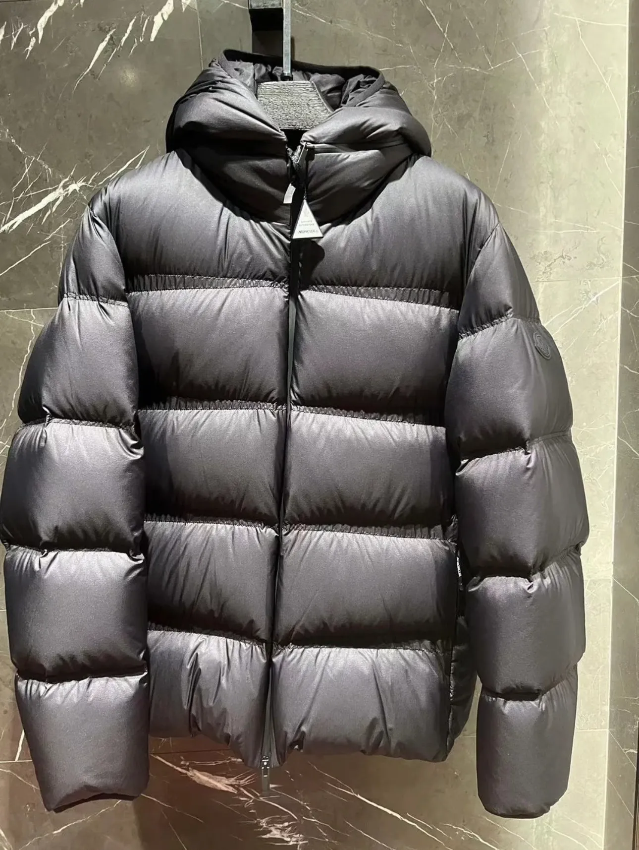 P900 Moncler Masac men's short down jacket. Real shot display at the counter.