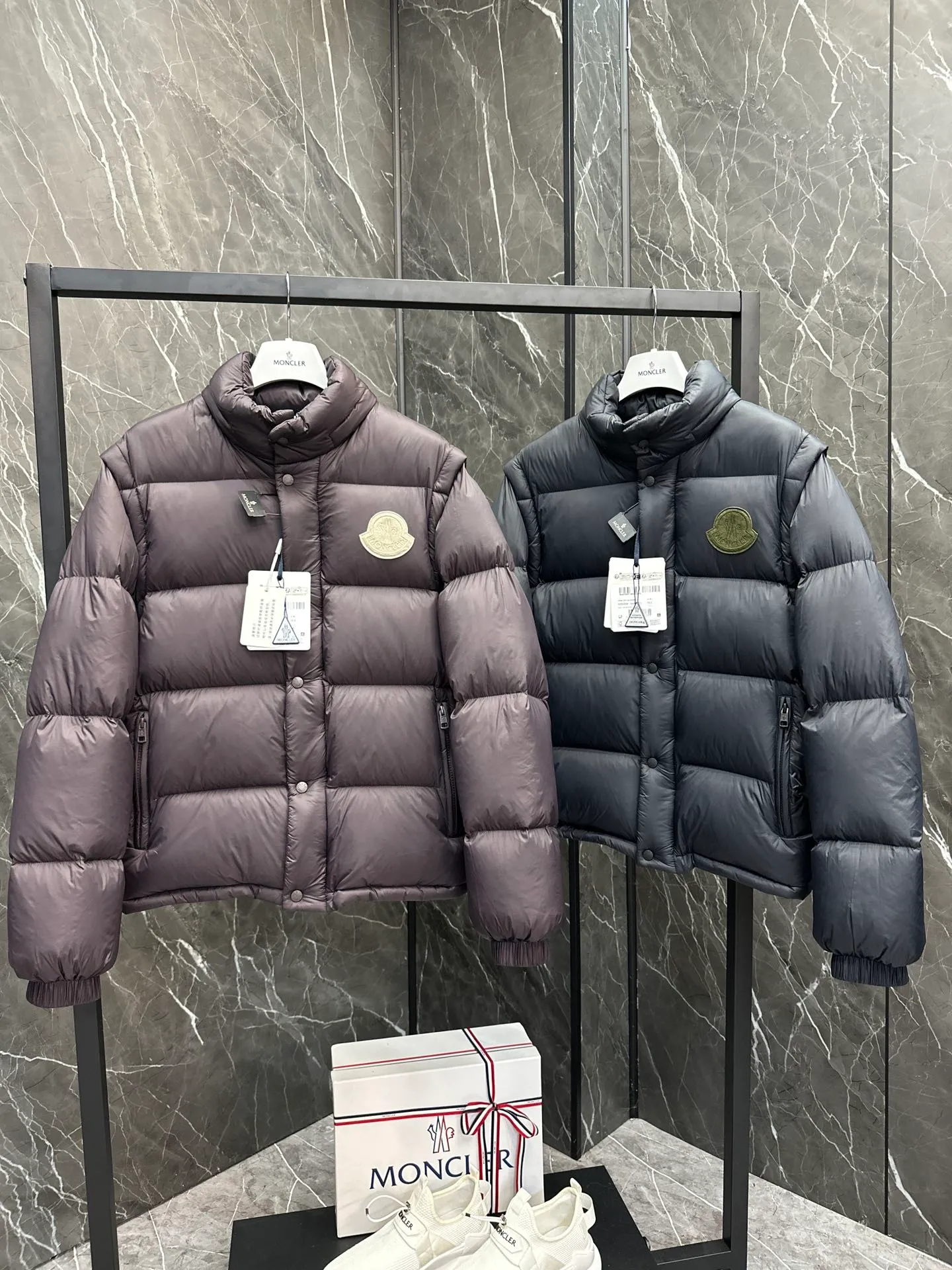 P800 Moncler Cyclone two-in-one down jacket. Black/dark navy/chocolate/baby blue. Available in four colors.