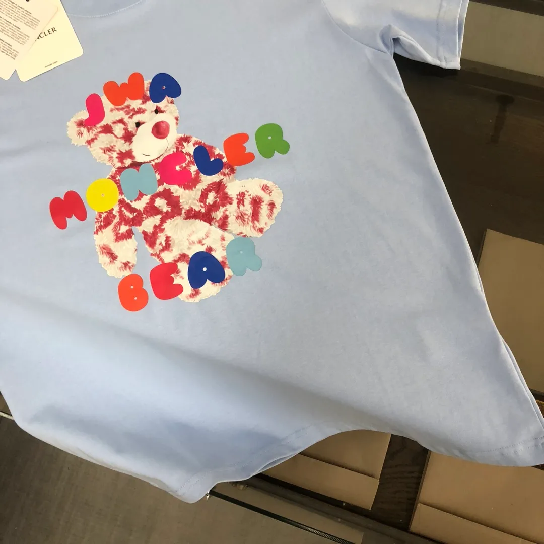 P160 MONCLER 25 The latest short-sleeved T-shirt for couples~Colorful bear element print~The upper body of the fabric is comfortable and breathable, not stiff, slim cut, made of high-customized pure cotton fabric! The upper body is comfortable and stylish, and it can be worn alone as an inner layer. It is a must-have for fashionistas! ! ! Color: Black White Orange Sky Blue Size: S M L XL (Loose fit! Please state your height and weight when placing an order)