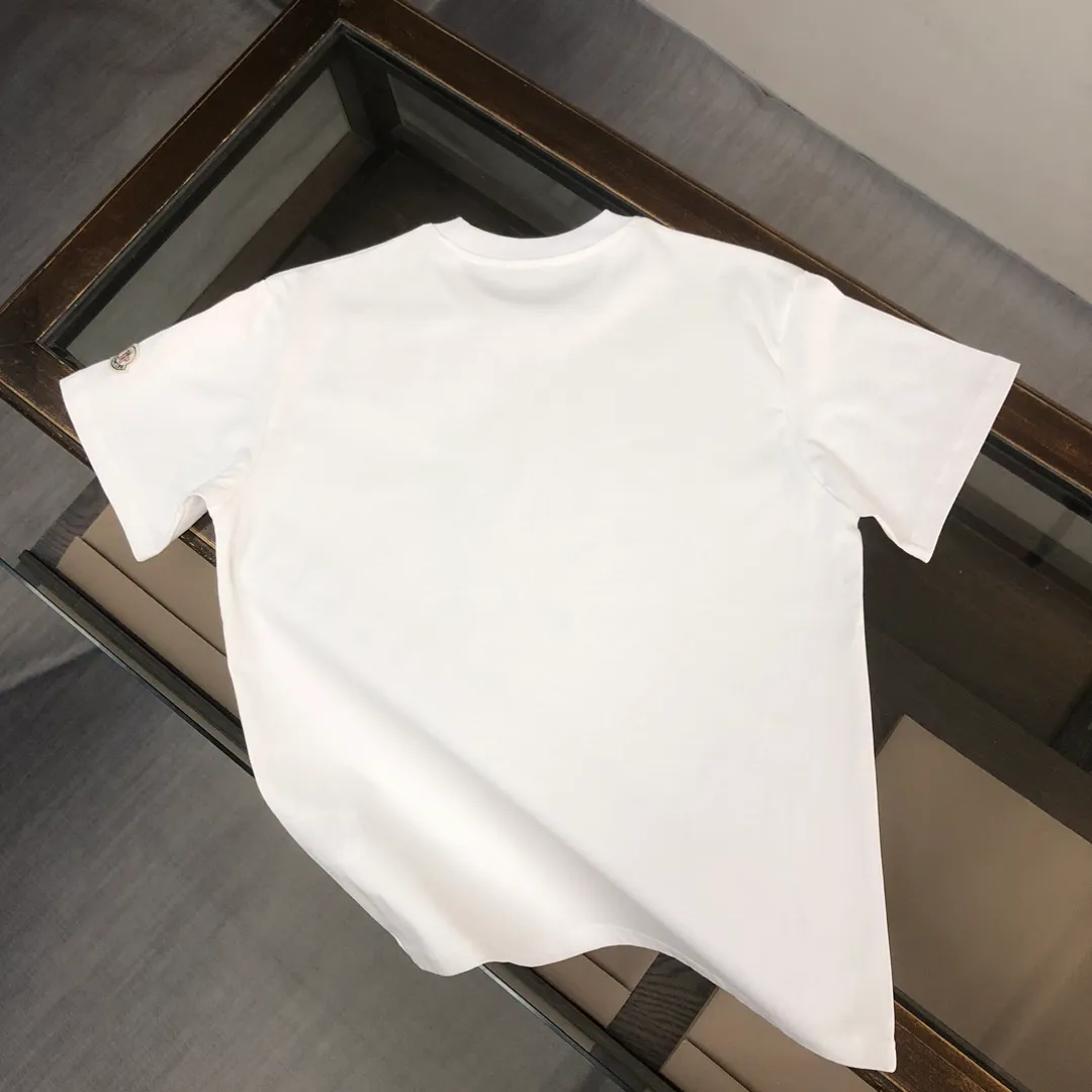 P160 🔥MONCLER The latest short-sleeved T-shirt for couples ~ color inkjet printed logo design ~ the fabric upper body is comfortable and breathable, not stiff, slim cut, made of high-end custom-made pure cotton fabric! The upper body is comfortable and stylish, and it can be worn alone as an inner layer. It is a must-have for fashionistas! ! ! Color: black white Size: S～XL (loose version, please state your height and weight when placing an order)