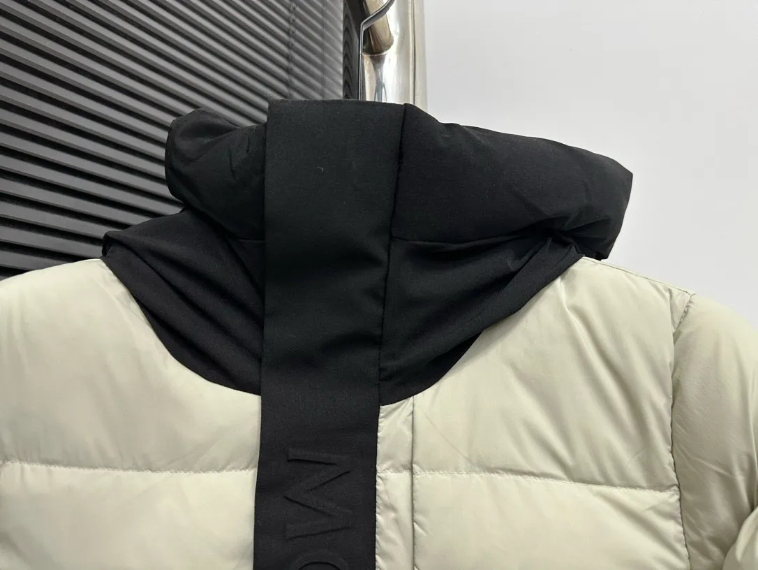 P820 ​​[Moncler] Mouth Guard Three-dimensional Embossed Letters Down Jacket Black Samurai Hooded Mid-Length Down Jacket Hard to find on the official website Filled with 95% goose down The Madeira down jacket is a staple item in the functional wardrobe. Made of Longuesaison nylon, it provides excellent warmth and comfort. Presented in calming neutral tones, the loose silhouette pays homage to clean design. Made from matt Longue Saison nylon Painted nylon lining Filled with down Hood and front placket made from 2.5 layers of fabric Logo lettering embossed Hidden button and zip closure Exterior pockets with concealed snap fastening Chest pockets with zipper closure Adjustable hood and flat elastic drawstring Matt black branding Sizes: 1 2 3 4 5