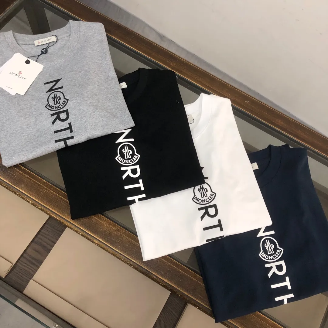 P150 MONCLER 25 The latest short-sleeved T-shirt for couples~Featured brand printing design~The upper body of the fabric is comfortable and breathable, not stiff, slim cut, and made of high-end custom-made pure cotton fabric! The upper body is comfortable and stylish, and it can be worn alone as an inner layer. It is a must-have for fashionistas! ! ! Color: black, white, sapphire blue, gray Size: S M L XL (loose fit! Please state your height and weight when placing an order)