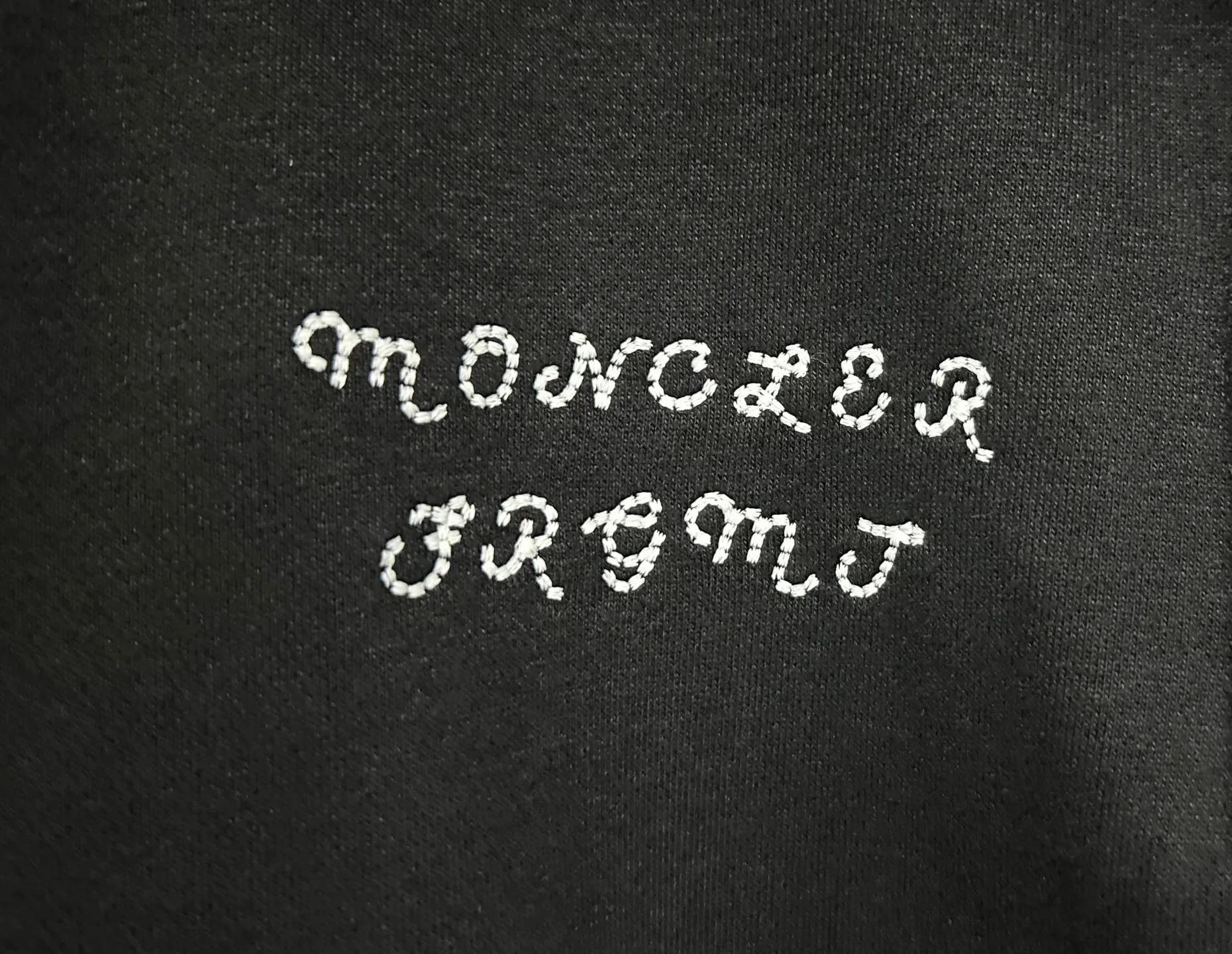 P380 MONCLER Mouth embroidery printed lapel sweatshirt Fabric: Made of 380g brushed sweatshirt terry, the fabric is brushed to make the surface feel softer and smoother. The thread is matched with 1*1 double yarn thread. The embroidery uses flat lines and is embellished with embroidered brand letters. The armband is made of sheepskin composite embroidery technology. The lower part of the sleeve is printed with artificial glue and ultra-fine film screen. This sweatshirt is made of cotton fleece fabric and is an everyday basic item in the Monclerx FRGMT co-creation series. Moncler Genius design piece with logo embroidery. Wear with matching bottoms for a complete look. Made of cotton fleece collar Half-zip closure Logo print and embroidery details Custom hardware Threads Trims Matching Fit Unisex -Color: Black -Size: S M L XL