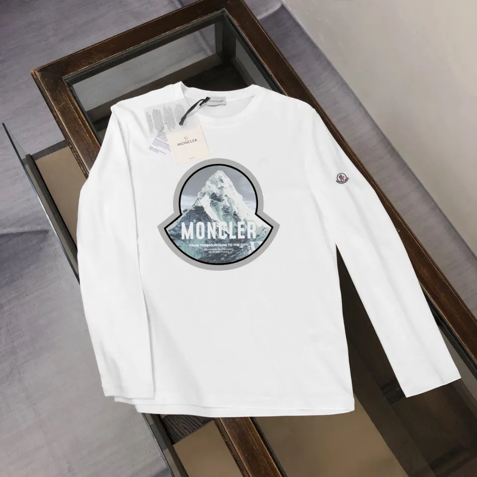 P180, a non-off-the-shelf model, you can trust it. Moncler printed long-sleeved T-shirt, 240g breathable cotton fabric, very soft and comfortable texture, does not shrink, does not deform, does not ball), can be worn alone as a base layer. Original customized accessories, collar label, care mark, hangtag, packaging (perfect details) Color: White Black Size: XS S M L