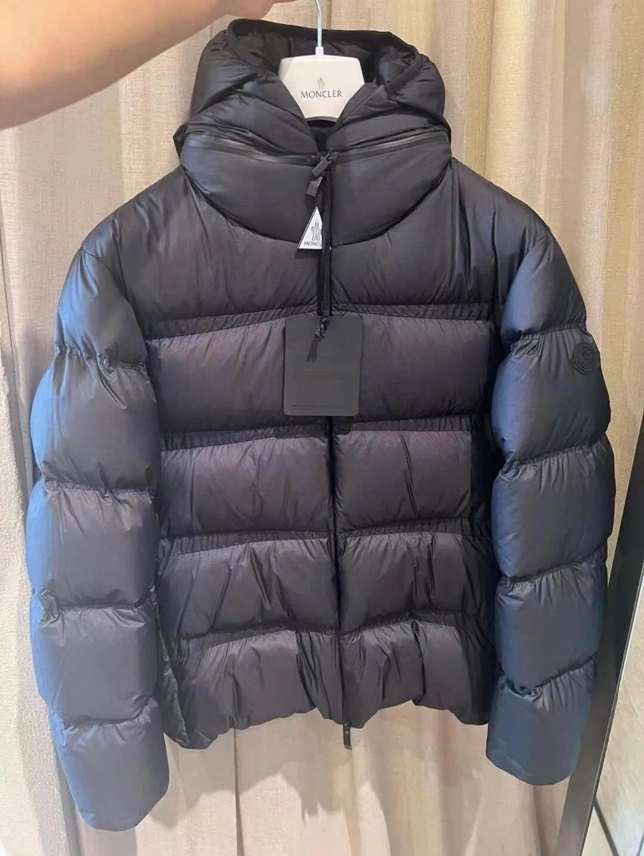 P900 Moncler Masac men's short down jacket. Real shot display at the counter.