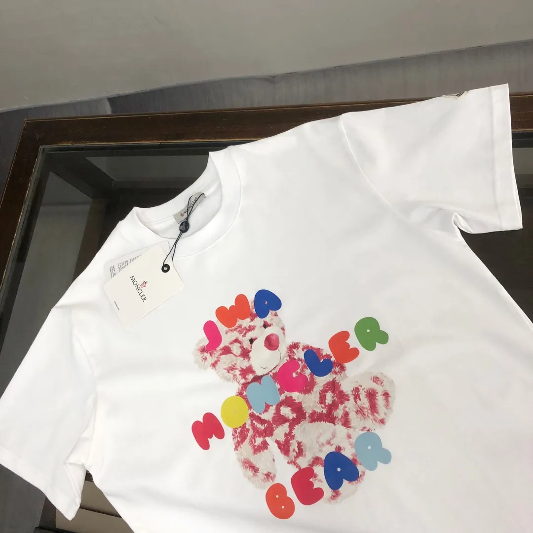 P160 MONCLER 25 The latest short-sleeved T-shirt for couples~Colorful bear element print~The upper body of the fabric is comfortable and breathable, not stiff, slim cut, made of high-customized pure cotton fabric! The upper body is comfortable and stylish, and it can be worn alone as an inner layer. It is a must-have for fashionistas! ! ! Color: Black White Orange Sky Blue Size: S M L XL (Loose fit! Please state your height and weight when placing an order)