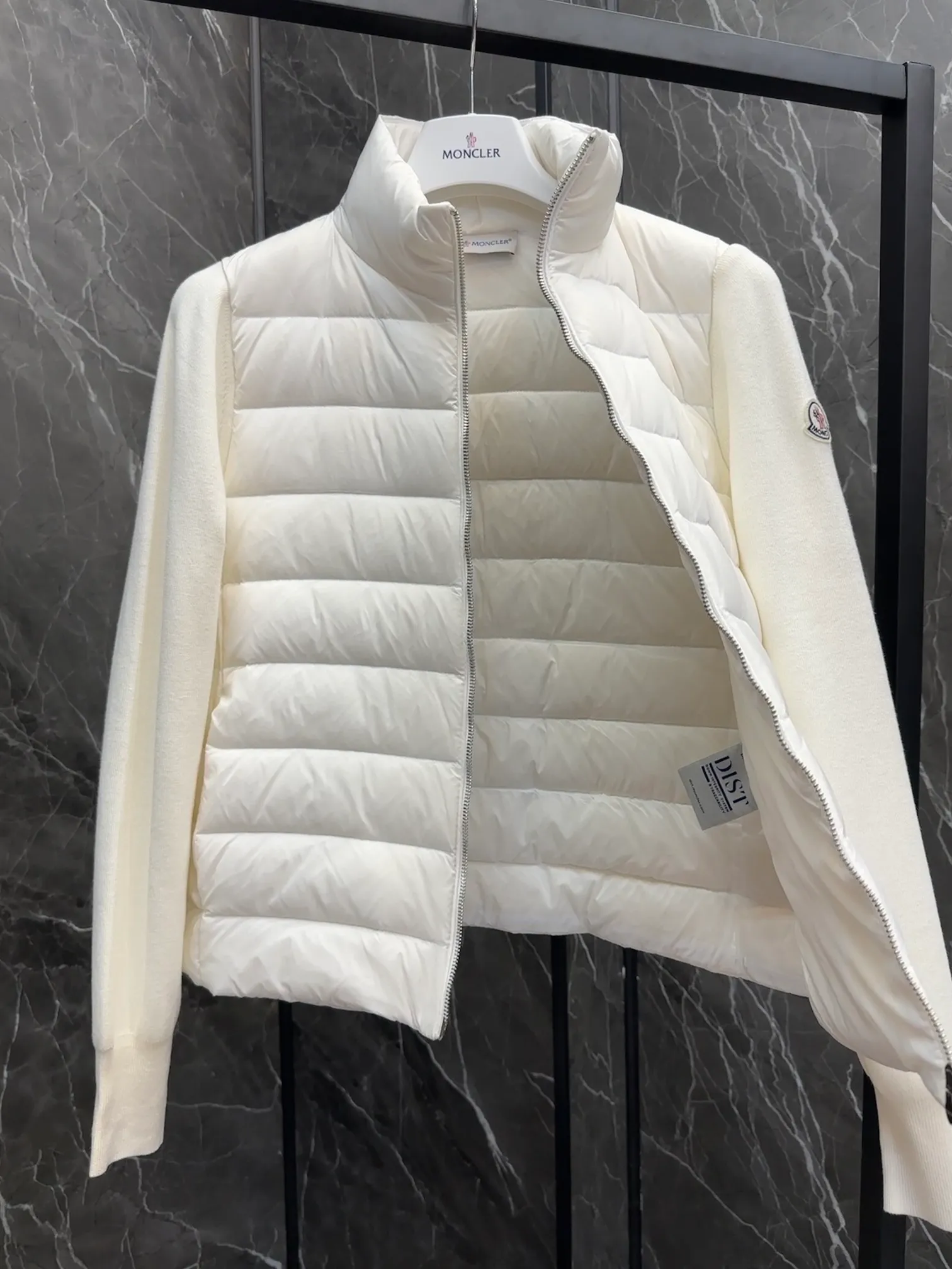 P660 New in Down⬆️Moncler Cardigan Women's Lightly Padded Wool Down Cardigan Jacket. This women's wool cardigan is filled with down and is suitable for all seasons.  This cardigan is a classic Moncler design that can be worn on its own when the weather is nice, or paired with jackets and coats when the weather cools down. Wool knit style with down-filled front for warmth and protection. Details Made of fine wool and nylon léger brillant •Nylon léger brillant lining •Down filling •Jersey knit •14 gauge •Zip closure •Zip pockets Size : 1-3 Black White