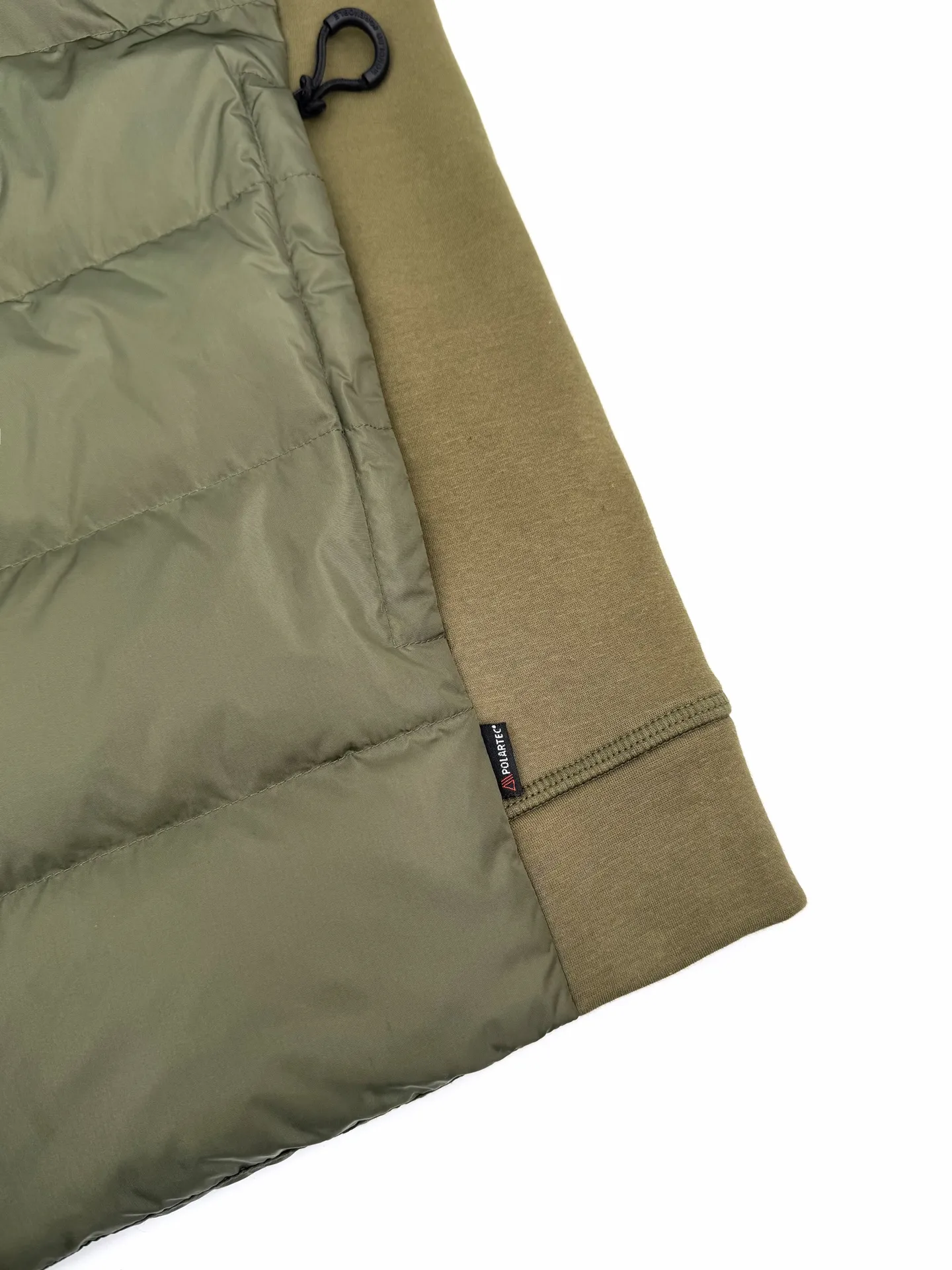 P780 Moncler logo woven splicing down jacket, custom-made matte lattice air shield down and 300D high-density calendered coating, using the new national standard 90 white duck down (welcome to test), full of down, full of warmth, light and fluffy, with the dark green of the overlapping mountains as the background, all things accumulating, creating its own scenery in silence The Monlcer triangle logo is embellished on the chest, the power aesthetics of the minimalist logo The concentrated down filling in the front area creates dynamic insulation for the core heat dissipation zone of the human body. The hooded down is a moving warm flow barrier for the head and neck, forming a thermal energy circulation system with the front area. The elastic woven sleeves provide freedom of movement with a sense of compression, forming a relaxed and warm philosophy. The real high-end is to let function become the footnote of style. Process 1: Computer mechanical down filling. Prioritize the liner pattern by making a pattern to determine the down filling area and determine the weight of down per square meter according to the original three-dimensional effect. Thus, the amount of down filling for each cut piece is calculated. The computer down filling machine uses a digital weighing unit to achieve stable measurement. Process 2: 3D three-dimensional quilting technology. With the programming system of the CNC quilting machine, the down in different areas is accurately separated to ensure that the filling is evenly fixed after sewing and avoid agglomeration or displacement. Process 3: Computer template machine line running process. The computer template machine line line process shows extremely high neatness and smoothness. The craftsman's precise control of the size during the operation ensures that each line meets the design requirements. The lines of the entire template are smooth and unified, neat and beautiful. Process 4: Triple locking five-thread dense stitching process. Main seam locking + diagonal reinforcement + raw edge wrapping. Triple structure to form a three-dimensional protective net at the edge of the fabric to avoid stitch breakage. Paving materials: Customized 1:1 Moncler zipper. Customized 1:1 Moncler rope loop. Customized 1:1 Moncler logo. Customized 1:1 Moncler. Corns Customized 1:1 Moncler trademark Size: S M L XL Style number: 25378