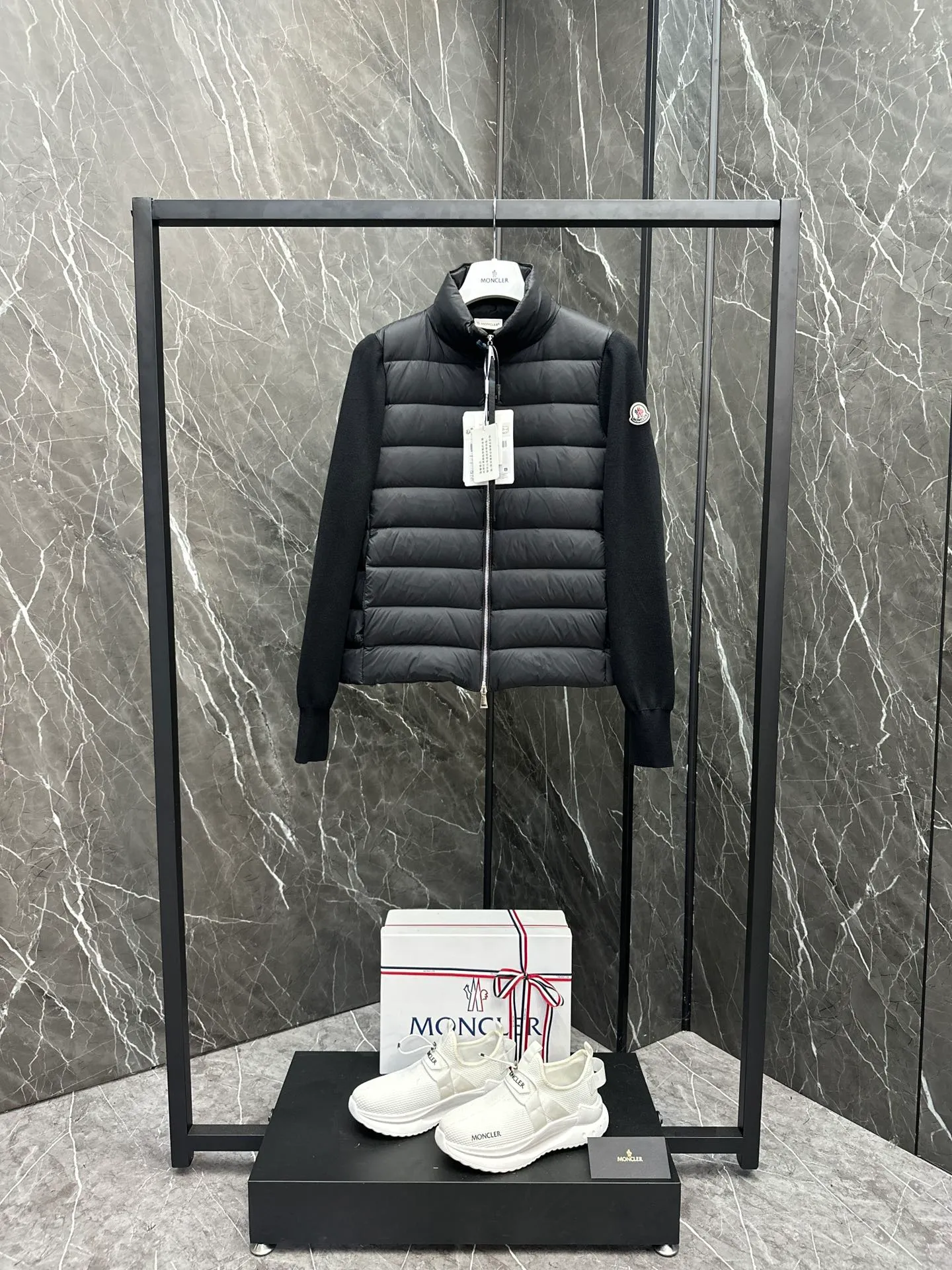 P660 New in Down⬆️Moncler Cardigan Women's Lightly Padded Wool Down Cardigan Jacket. This women's wool cardigan is filled with down and is suitable for all seasons.  This cardigan is a classic Moncler design that can be worn on its own when the weather is nice, or paired with jackets and coats when the weather cools down. Wool knit style with down-filled front for warmth and protection. Details Made of fine wool and nylon léger brillant •Nylon léger brillant lining •Down filling •Jersey knit •14 gauge •Zip closure •Zip pockets Size : 1-3 Black White