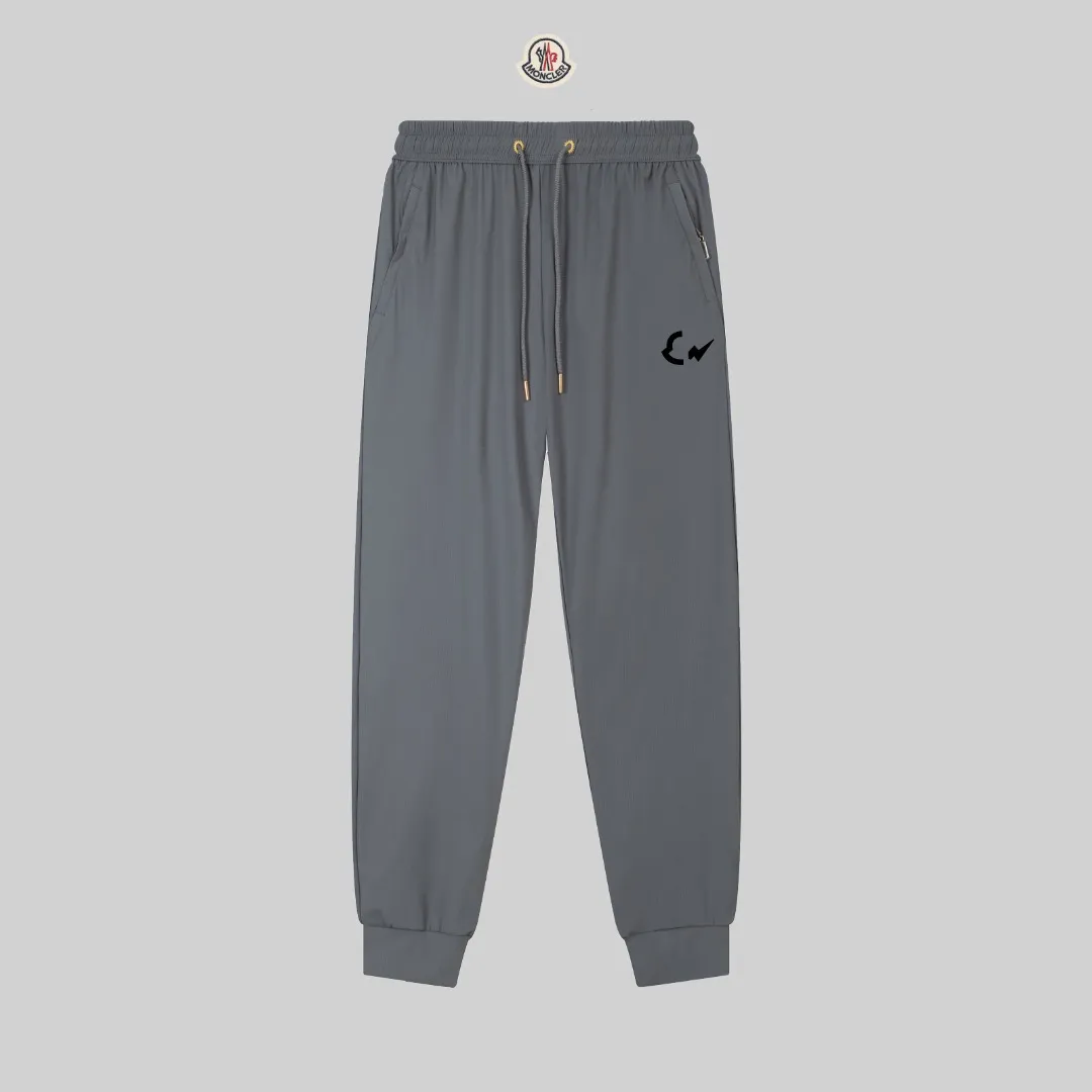 P230 Moncler spring and summer new model, two-color high-quality thin sports and leisure ice silk pants. Smooth, comfortable, anti-wrinkle and traceless pants. 🗯Soft texture, slightly elastic to the touch, cool ice silk pants. Waist elastic band, fashionable version design. 🗯 Neat and neat wiring, suitable for both sports and leisure! It can be easily controlled by all body types. Two classic colors are available. 🗯New summer product. Versatile and easy to match. The upper body is very simple, handsome and stylish. It can be easily controlled by men and women. Color: Black Gray Size: S-XL
