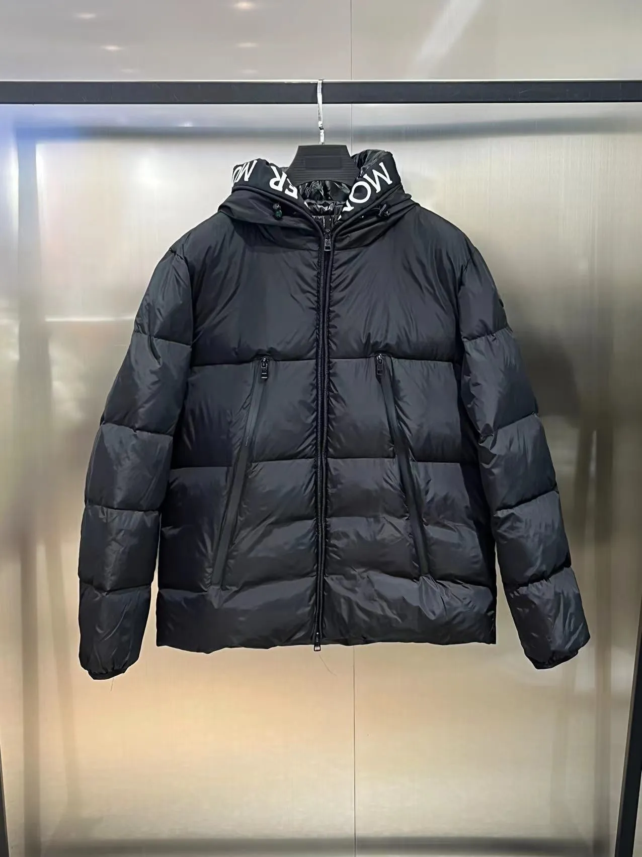 P800 ⬆️🆕❤️The Montclar jacket is a nod to the 80s brands that made Moncler a global icon. Waterproof with optimal insulation and an embroidered logo on the bonnet and trim, always on the podium. Jacket in down-quilted nylon raincoat fabric. Die-cast zip front placket and pockets. Moncler embroidered ribbon trim on the hood and inside jacket closure. Adjustable elastic drawcord hood and hem. Technical knit cuffs with Moncler signature. LG black label, white label, color: black white label, black black label, white black label, white white label, blue, red, code number: 12345