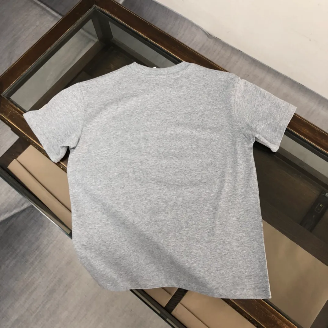P150 Moncler 2025 new men's round neck short-sleeved couple's T-shirt, new spring and summer product, high quality 🔥🔥Fashionable and versatile, customized imported fabrics, comfortable to wear, breathable, fashionable without losing personality, casual and casual upper body, handsome and stylish, showing the temperament of a big brand. All three standards are complete! ! Color: Black White Gray Royal Blue Size: S-XL (loose fit)
