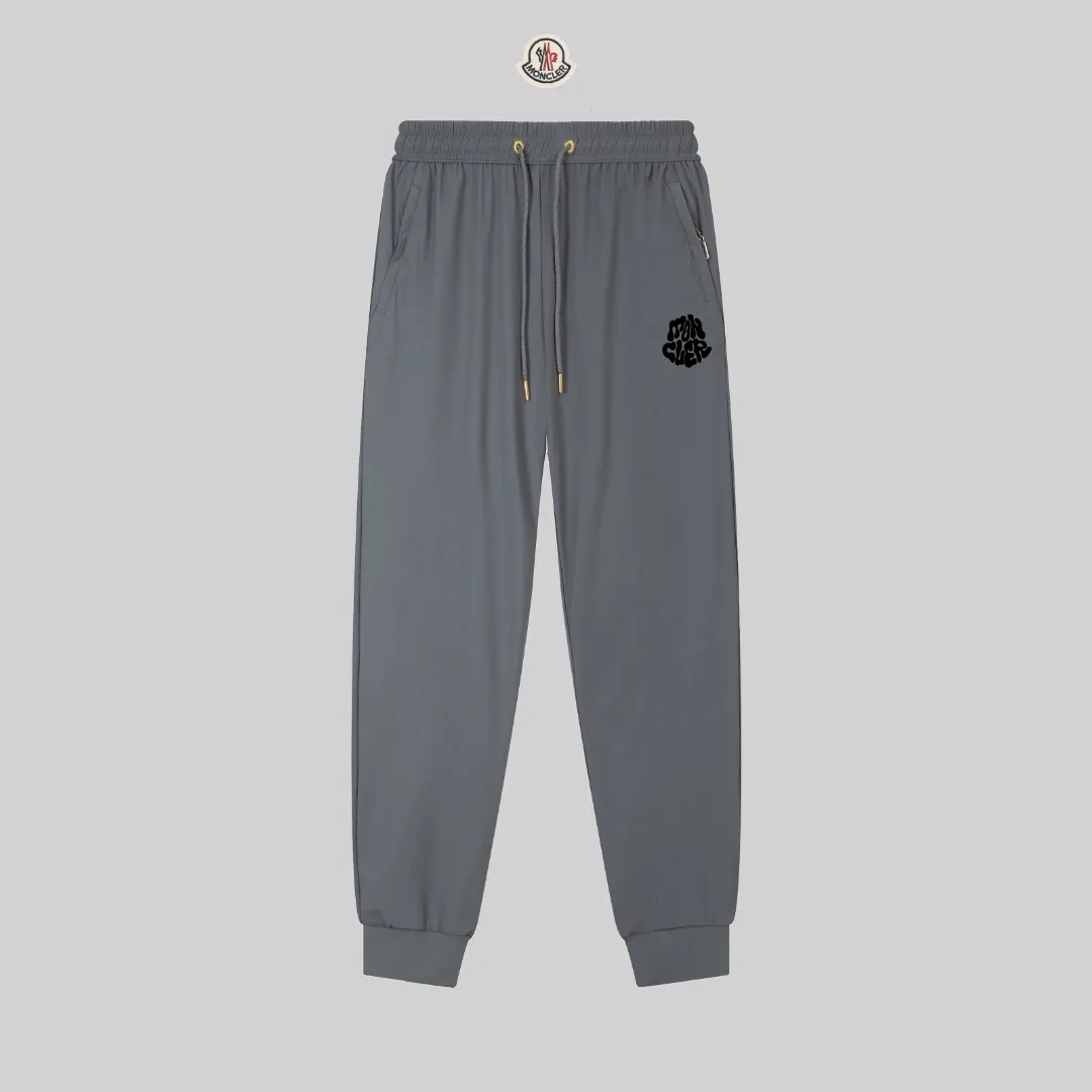 P230 Moncler spring and summer new model, two-color high-quality thin sports and leisure ice silk pants. Smooth, comfortable, anti-wrinkle and traceless pants. 🗯Soft texture, slightly elastic to the touch, cool ice silk pants. Waist elastic band, fashionable version design. 🗯 Neat and neat wiring, suitable for both sports and leisure! It can be easily controlled by all body types. Two classic colors are available. 🗯New summer product. Versatile and easy to match. The upper body is very simple, handsome and stylish. It can be easily controlled by men and women. Color: Black Gray Size: S-XL
