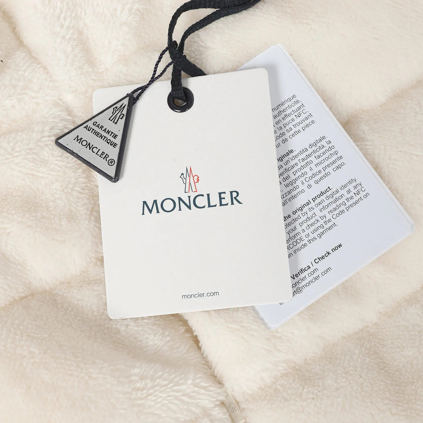 P580 🔥Moncler Women's Wool Teddy Down Jacket. This cardigan is made of wool and teddy style fabrics, providing a soft and comfortable wearing experience. Midweight knitted piece with down-filled front and back that can easily be worn as a outer layer in warmer weather. Fabric: Sleeves and collar made of woolen wool, Longue saison lining, 90% goose down, Craftsmanship: Front and back filled with down teddy style, purl stitch, 5 stitches, zipper closure, zipper pockets, ribbed cuffs Style: A75# Color: Pink White Gray Size: S M L
